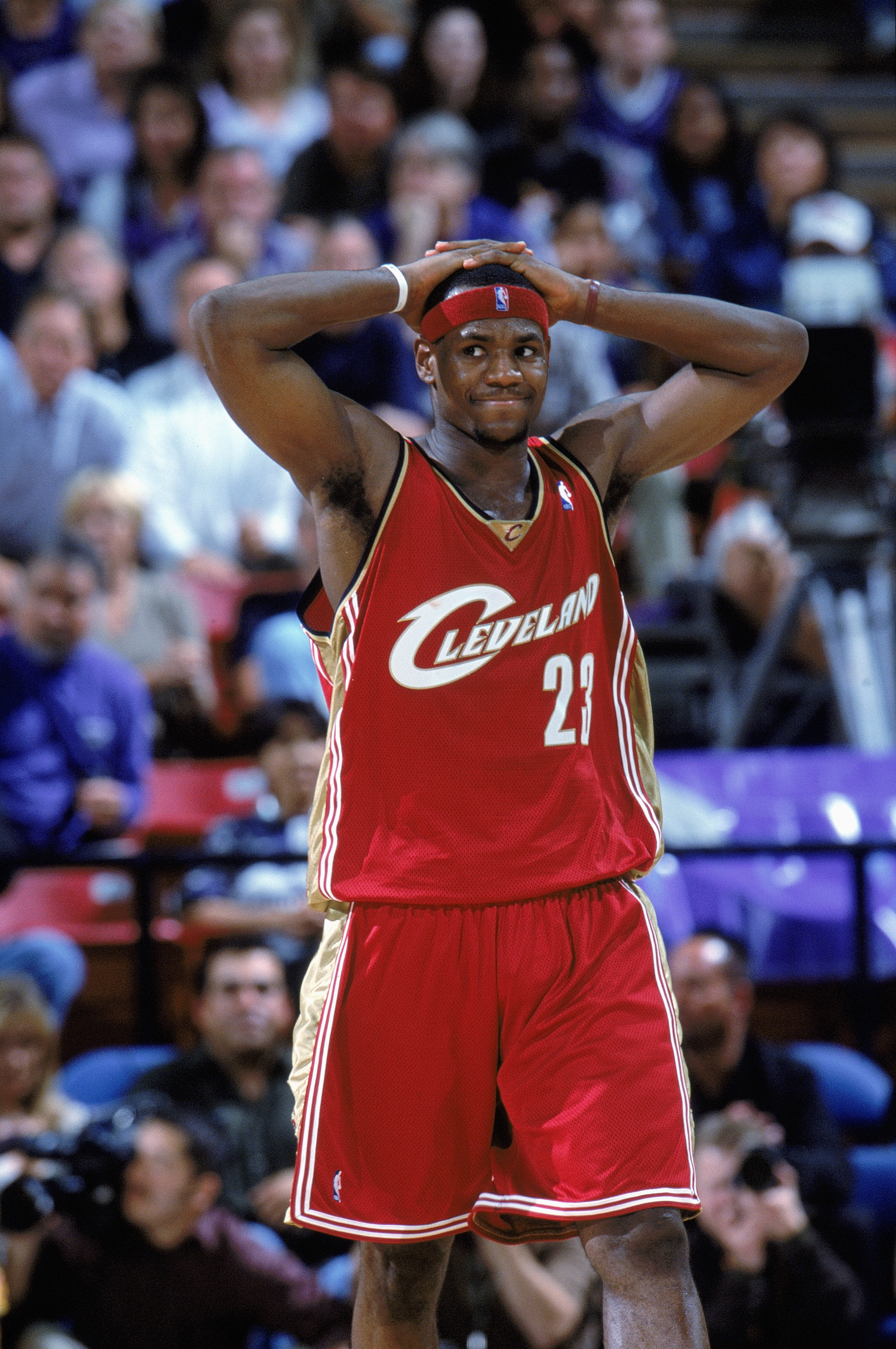 SACRAMENTO, CA - OCTOBER 29:  LeBron James #23 of the Cleveland Cavaliers reacts during the NBA game against the Sacramento Kings at Arco Arena on October 29, 2003 in Sacramento, California.  The Kings defeated the Cavaliers 106-92.  NOTE TO USER:  User expressly acknowledges and agrees that, by downloading and/or using this Photograph, User is consenting to the terms and conditions of the Getty Images License Agreement.  Copyright 2003 NBAE  (Photo by Andrew D. Bernstein/NBAE via Getty Images) 