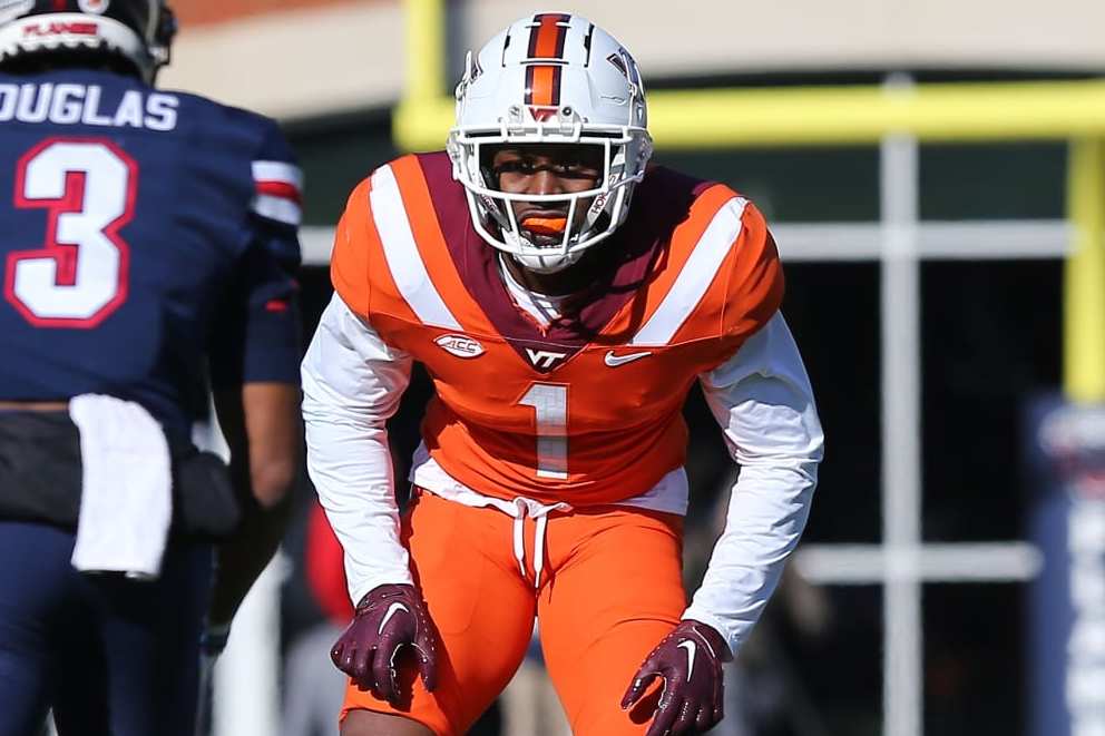 LYNCHBURG, VA - NOVEMBER 19: Virginia Tech Hokies defensive back Chamarri Conner (1) prepares to defend Liberty Flames wide receiver Demario Douglas (3) during a college football game between the Virginia Tech Hokies and the Liberty Flames on November 19, 2022, at Williams Stadium in Lynchburg, VA. (Photo by Lee Coleman/Icon Sportswire via Getty Images)
