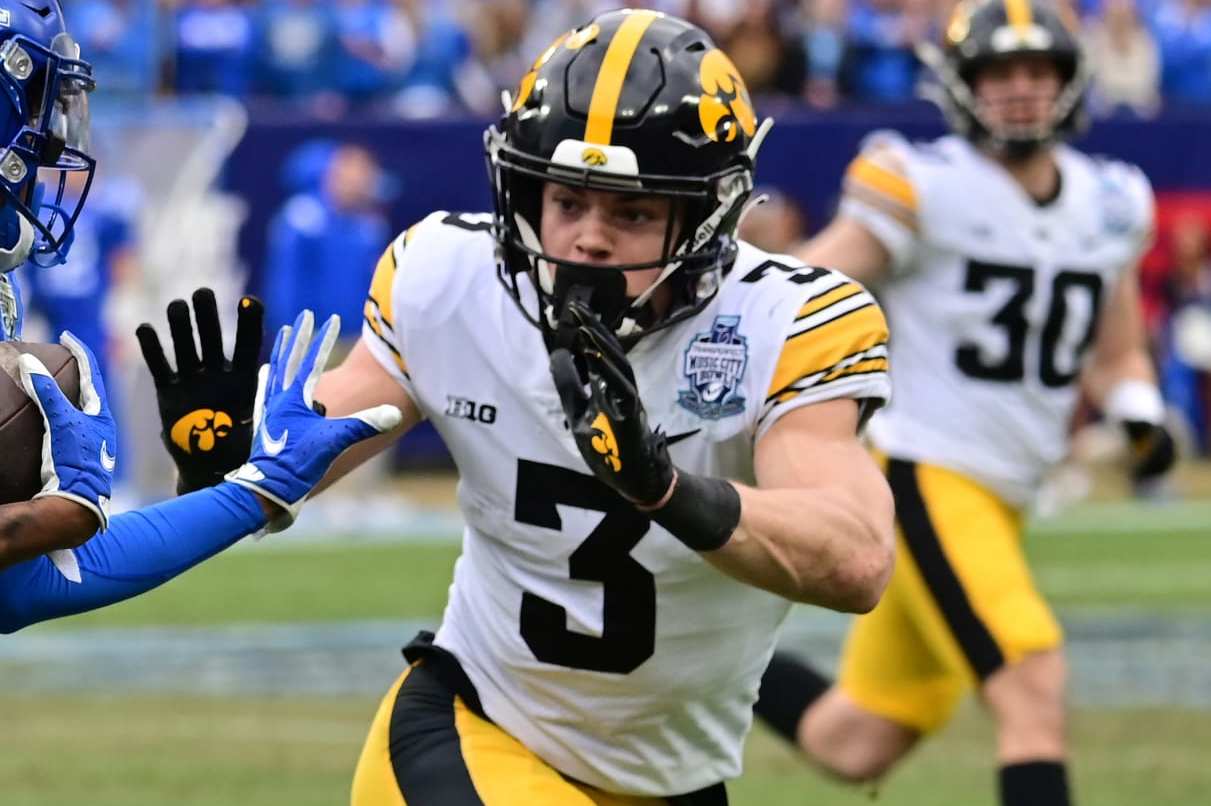 NASHVILLE, TN - DECEMBER 31: Iowa left cornerback Cooper DeJean (3) goes after Kentucky wide receiver Marion Brown (2) during the TransPerfect Music City Bowl game between the Kentucky Wildcats and the Iowa Hawkeyes on December 31, 2022, at Nissan Stadium in Nashville, TN (Photo by Keith Gillett/Icon Sportswire via Getty Images)