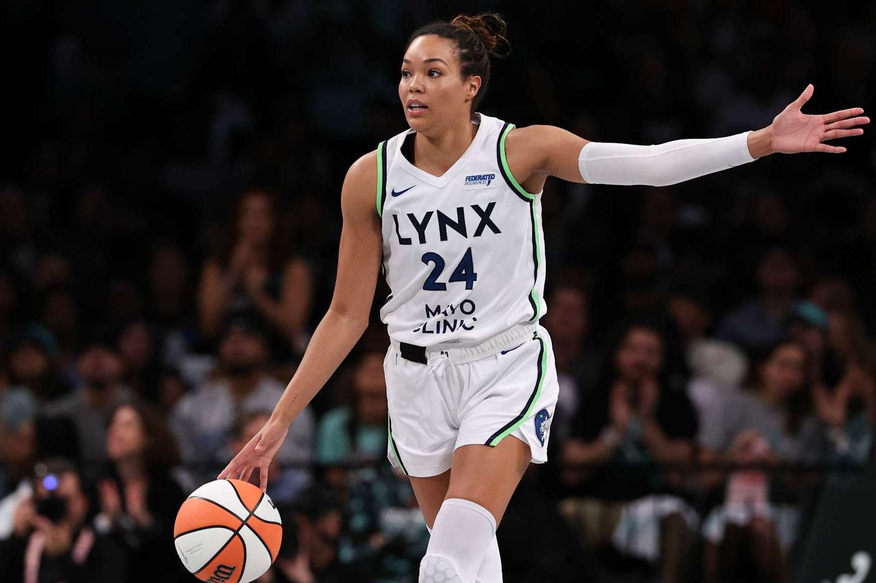 NEW YORK, NEW YORK - OCTOBER 20: (EDITOR'S NOTE: This image was sent with alternate crop.) Napheesa Collier #24 of the Minnesota Lynx calls a play during the first half against the New York Liberty during Game Five of the WNBA Finals at Barclays Center on October 20, 2024 in New York City. (Photo by Elsa/Getty Images)