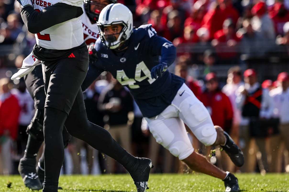 STATE COLLEGE, PA - NOVEMBER 18: Gavin Wimsatt #2 of the Rutgers Scarlet Knights attempts a pass as Chop Robinson #44 of the Penn State Nittany Lions defends during the first half at Beaver Stadium on November 18, 2023 in State College, Pennsylvania. (Photo by Scott Taetsch/Getty Images)