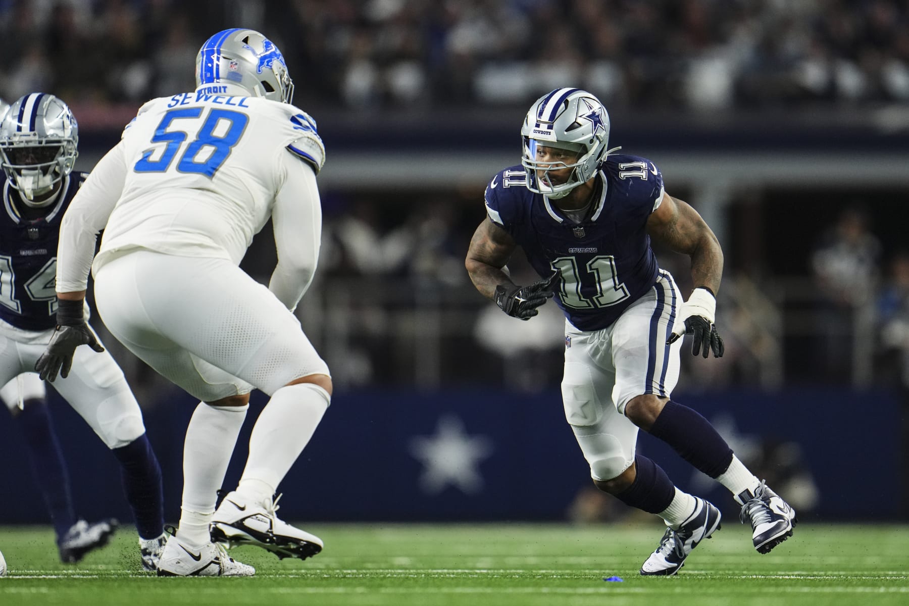 ARLINGTON, TX - DECEMBER 30: Micah Parsons #11 of the Dallas Cowboys rushes the passer during an NFL football game against the Detroit Lions at AT&T Stadium on December 30, 2023 in Arlington, Texas. (Photo by Cooper Neill/Getty Images)