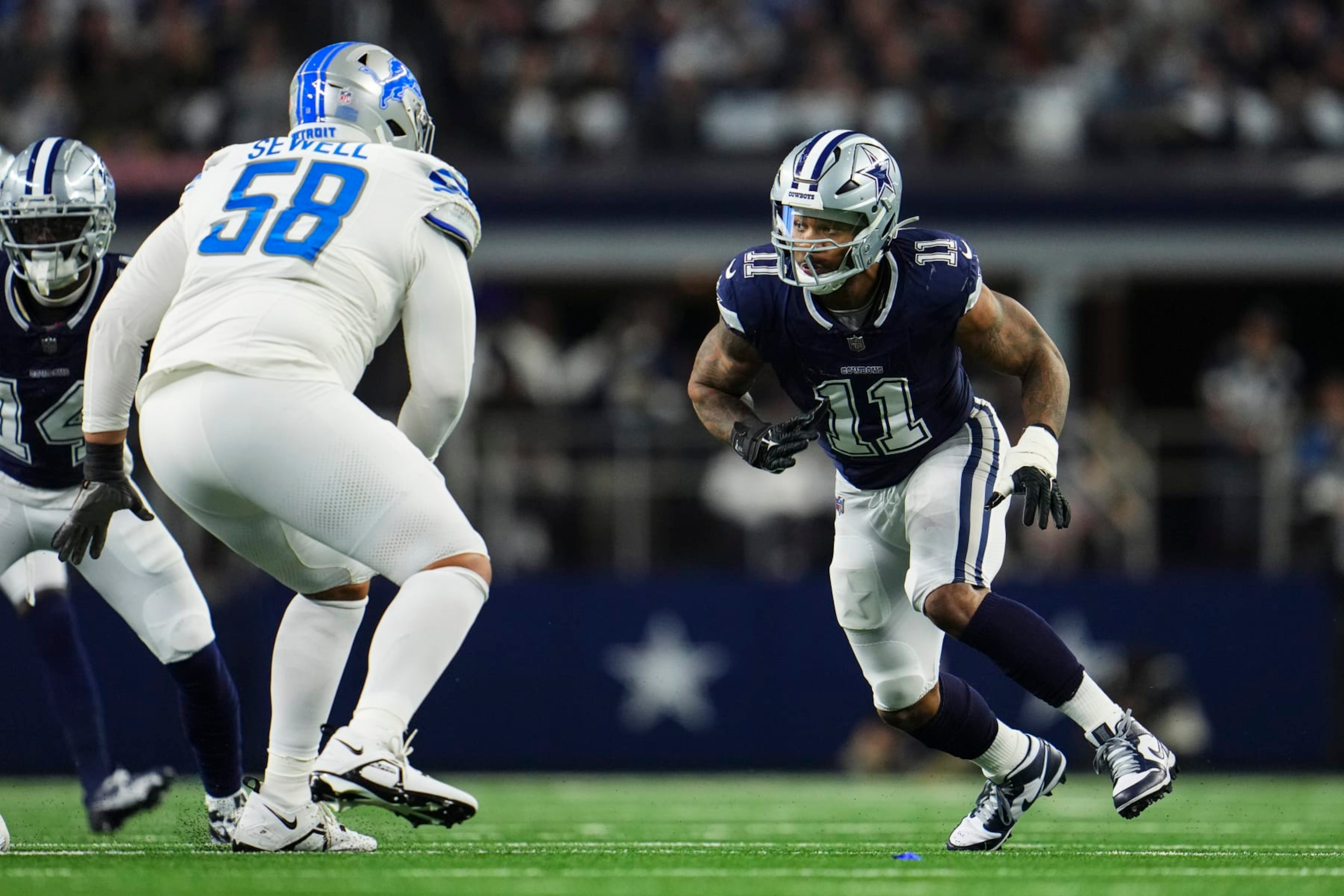 ARLINGTON, TX - DECEMBER 30: Micah Parsons #11 of the Dallas Cowboys rushes the passer during an NFL football game against the Detroit Lions at AT&T Stadium on December 30, 2023 in Arlington, Texas. (Photo by Cooper Neill/Getty Images)