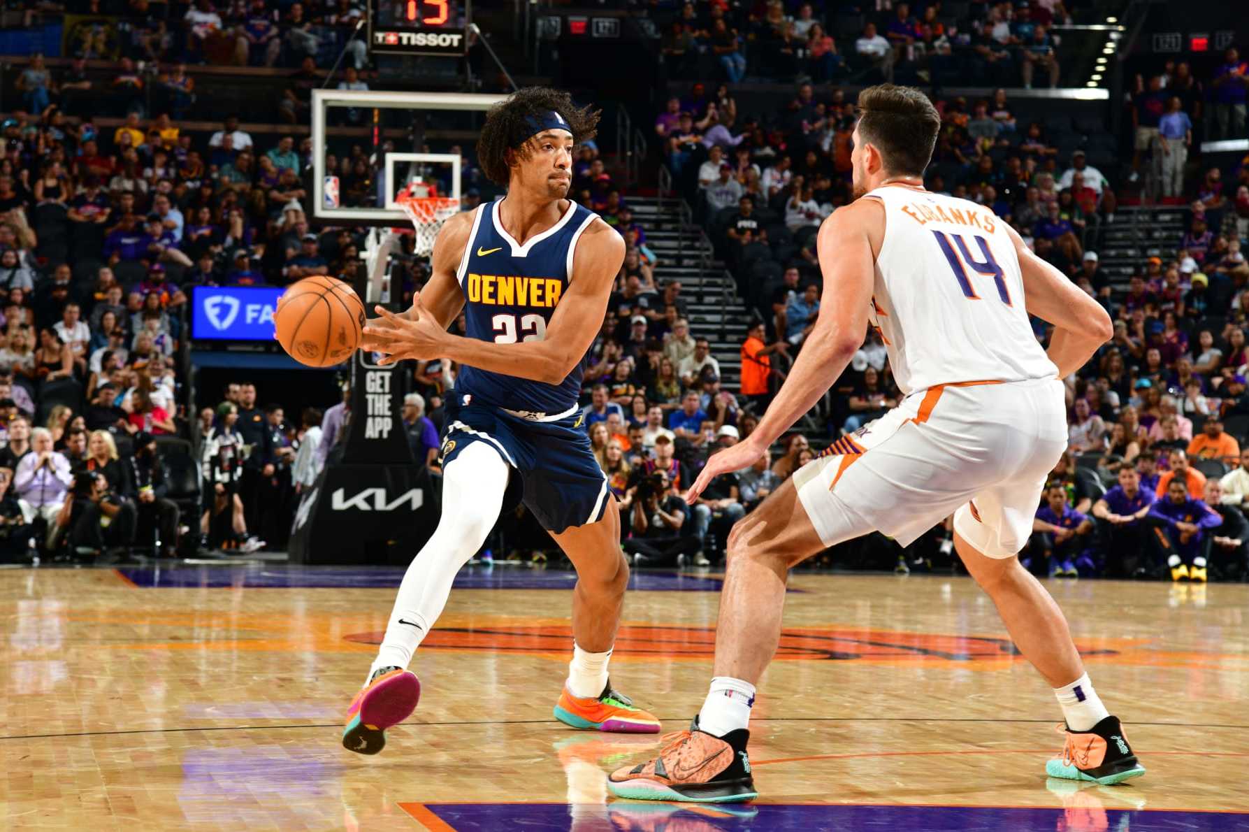 PHOENIX, AZ - OCTOBER  10: Zeke Nnaji #22 of the Denver Nuggets looks to pass the ball during the game against the Phoenix Suns on October 10, 2023 at Footprint Center in Phoenix, Arizona. NOTE TO USER: User expressly acknowledges and agrees that, by downloading and or using this photograph, user is consenting to the terms and conditions of the Getty Images License Agreement. Mandatory Copyright Notice: Copyright 2023 NBAE (Photo by Kate Frese/NBAE via Getty Images)