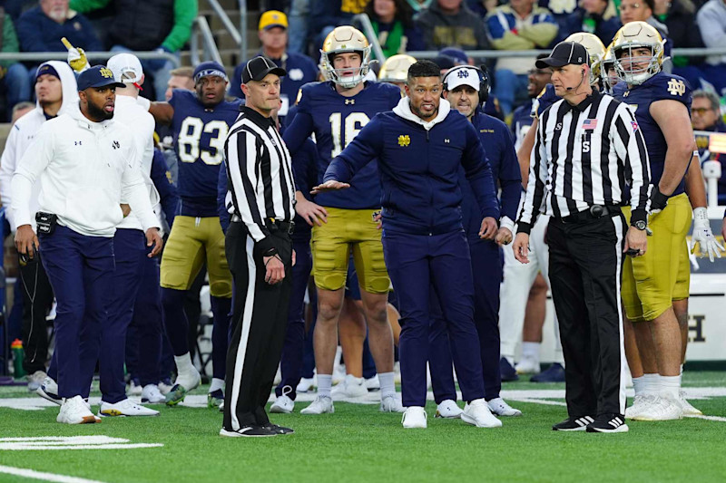 SOUTH BEND, IN - NOVEMBER 16: Notre Dame Fighting Irish coach Marcus Freeman is upset at the referees for calling a flag on a fake punt that initially scored a touchdown but was nullified for an illegal formation during a game against the Virginia Cavaliers on November 16, 2024, at Notre Dame Stadium in South Bend, Indiana. Photo by Brian Spurlock/Icon Sportswire via Getty Images)