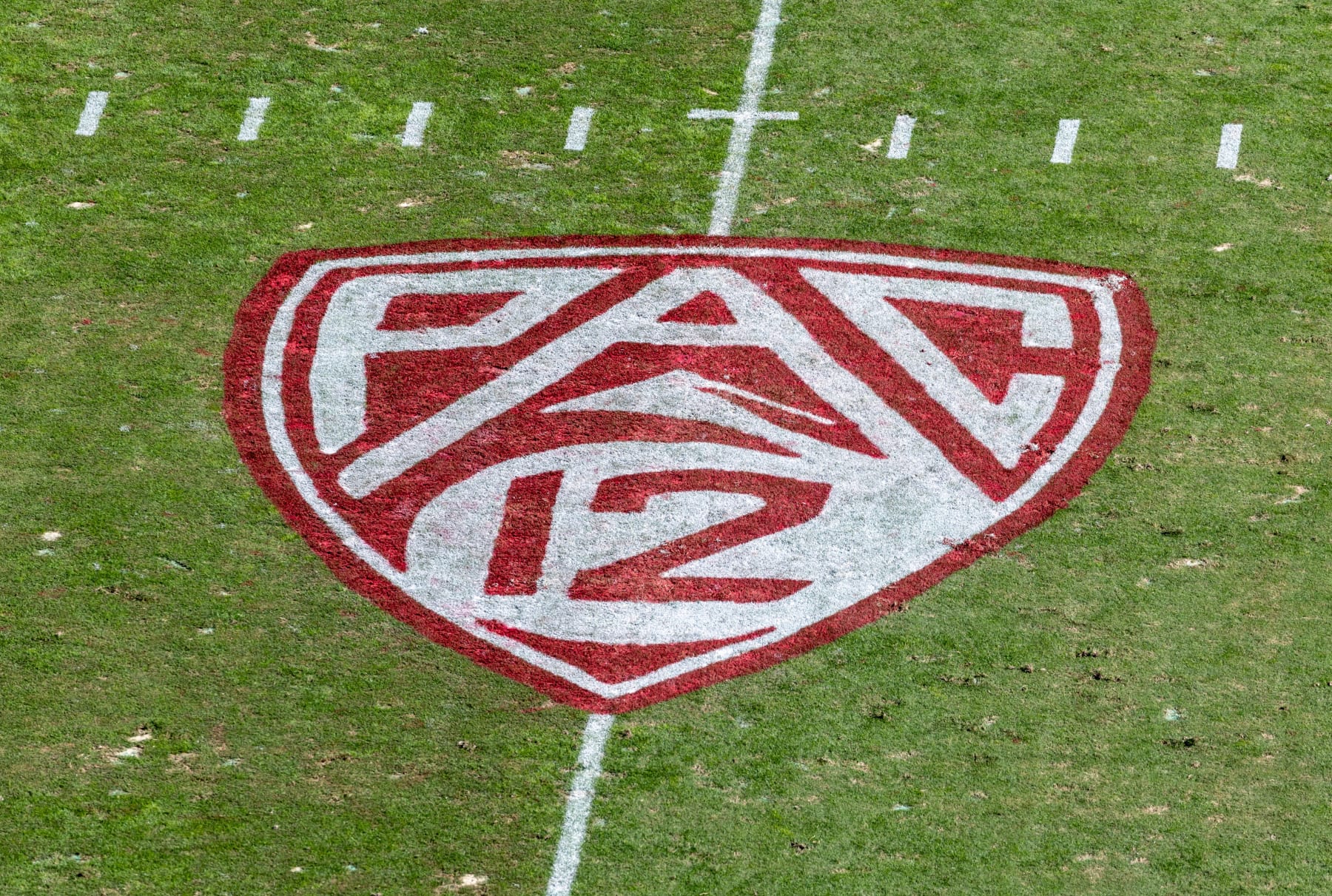 PALO ALTO, CA - OCTOBER 22: A high angle view of the Pac-12 logo on the field at Stanford Stadium during an NCAA Pac-12 college football game between the Arizona State Sun Devils and the Stanford Cardinal on October 22, 2022 at Stanford Stadium in Palo Alto, California. (Photo by David Madison/Getty Images)