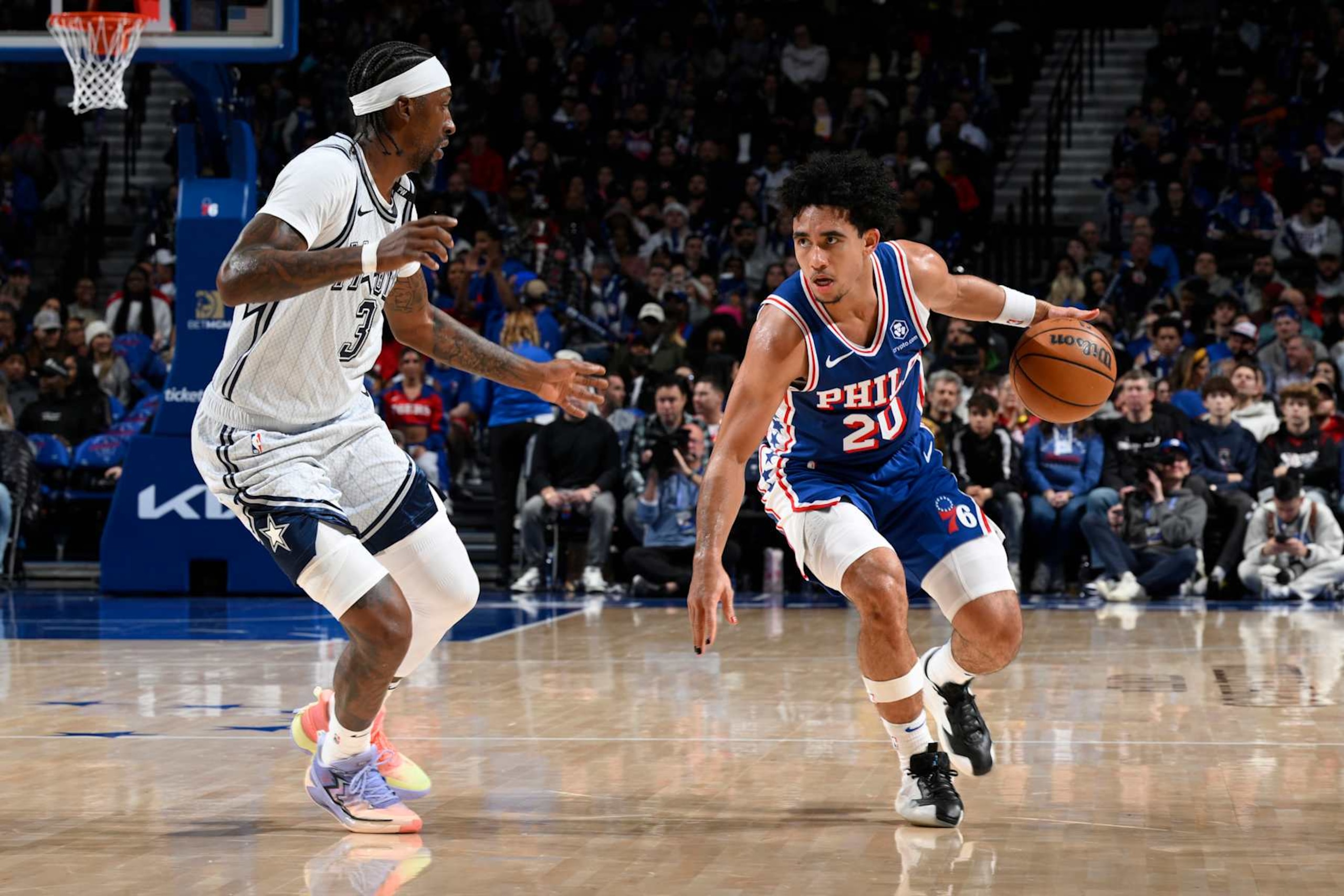 PHILADELPHIA, PA - DECEMBER 4: Jared McCain #20 of the Philadelphia 76ers dribbles the ball during the game against the Orlando Magic on December 4, 2024 at the Wells Fargo Center in Philadelphia, Pennsylvania NOTE TO USER: User expressly acknowledges and agrees that, by downloading and/or using this Photograph, user is consenting to the terms and conditions of the Getty Images License Agreement. Mandatory Copyright Notice: Copyright 2024 NBAE (Photo by David Dow/NBAE via Getty Images)