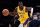 MEMPHIS, TENNESSEE - DECEMBER 29: Los Angeles Lakers guard Darren Collison #21 brings the ball up court during the game against the Memphis Grizzlies at FedExForum on December 29, 2021 in Memphis, Tennessee. NOTE TO USER: User expressly acknowledges and agrees that, by downloading and or using this photograph, User is consenting to the terms and conditions of the Getty Images License Agreement.  (Photo by Justin Ford/Getty Images)