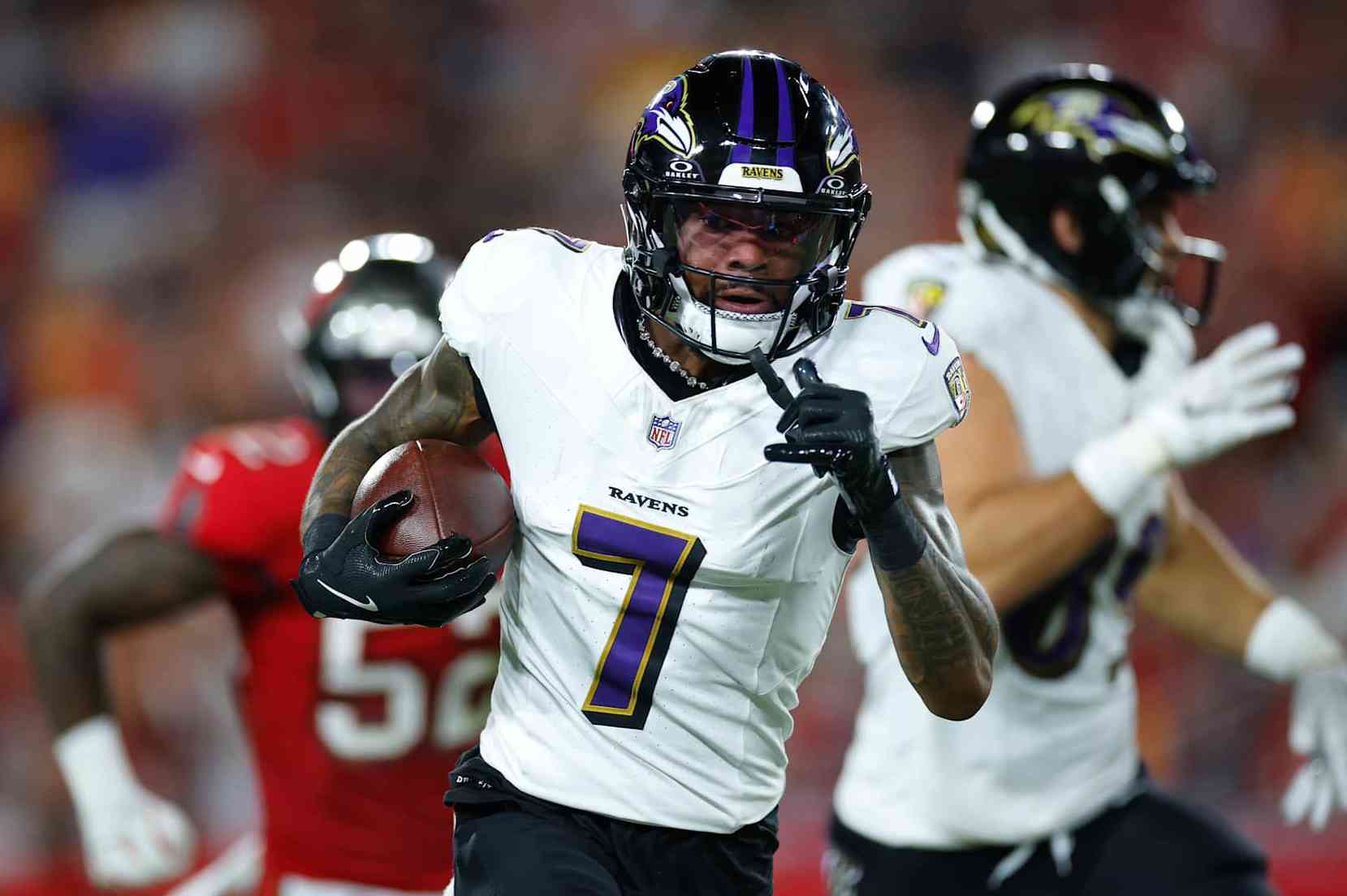 TAMPA, FLORIDA - OCTOBER 21: Rashod Bateman #7 of the Baltimore Ravens runs the ball during the second quarter against the Tampa Bay Buccaneers at Raymond James Stadium on October 21, 2024 in Tampa, Florida. (Photo by Mike Ehrmann/Getty Images)