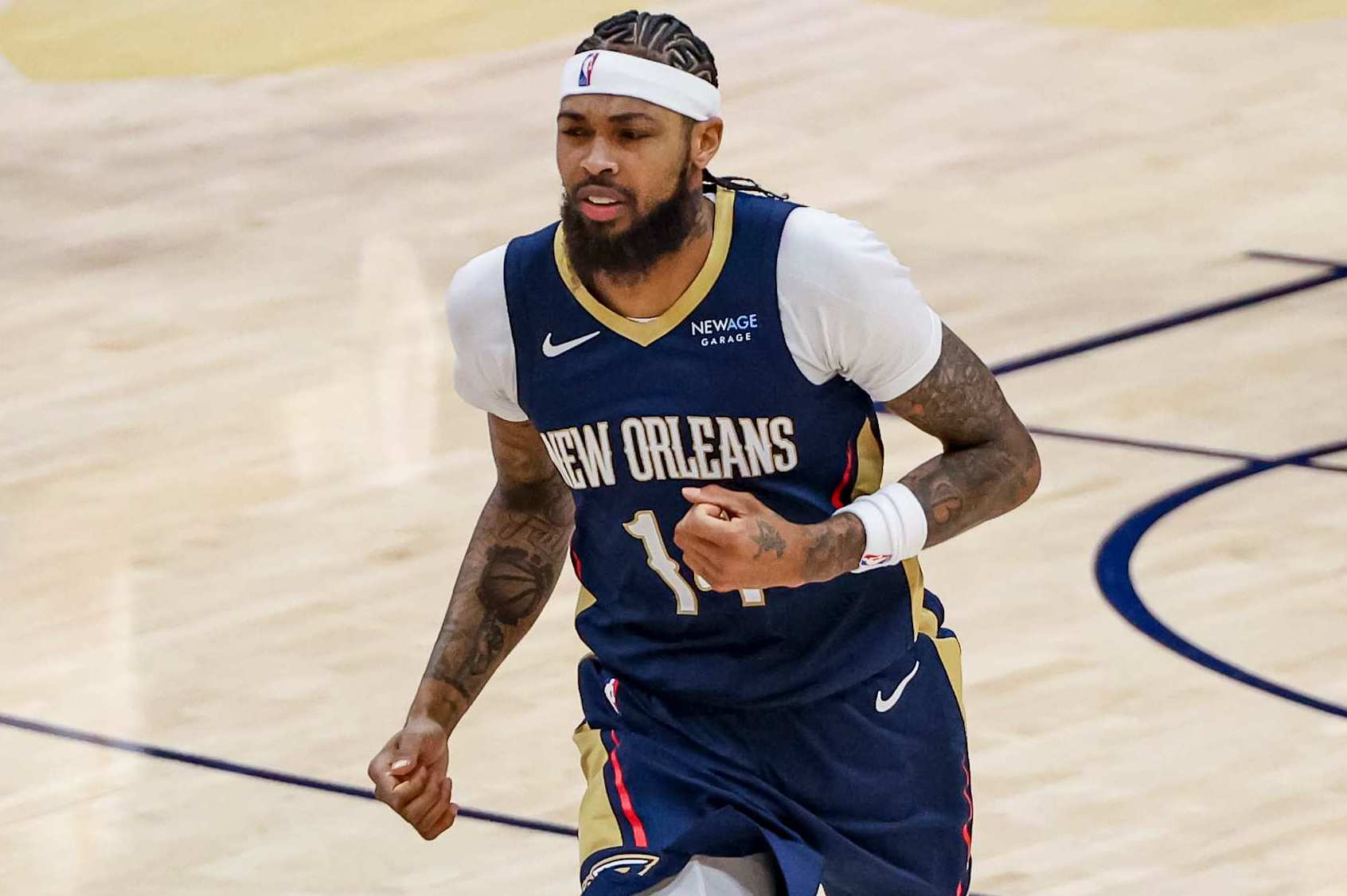NEW ORLEANS, LOUISIANA - DECEMBER 5:  Brandon Ingram #14 of the New Orleans Pelicans plays against the Phoenix Suns during the first half of a game at the Smoothie King Center on December 5, 2024 in New Orleans, Louisiana. NOTE TO USER: User expressly acknowledges and agrees that, by downloading and or using this photograph, User is consenting to the terms and conditions of the Getty Images License Agreement. (Photo by Derick E. Hingle/Getty Images)