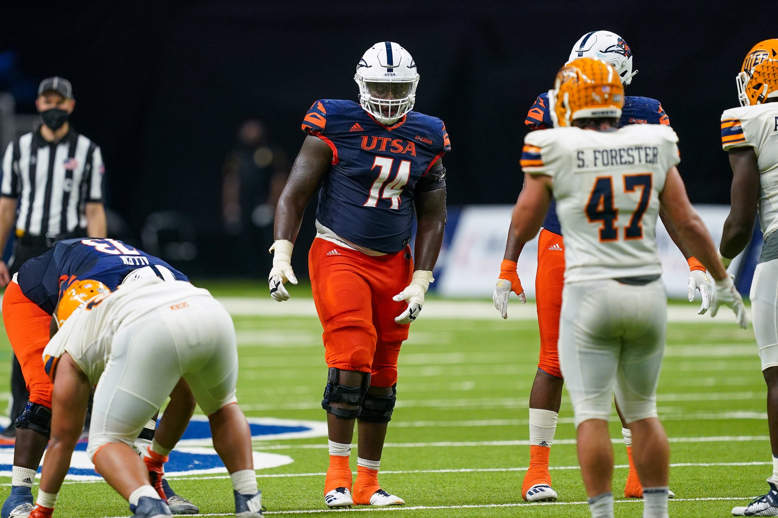 SAN ANTONIO, TX - NOVEMBER 14: UTSA Roadrunners offensive lineman Spencer Burford (74) gets ready for a play during the game between the UTEP Miners and the UTSA Roadrunners on November 14, 2020 at the Alamodome in San Antonio, Texas. (Photo by Daniel Dunn/Icon Sportswire via Getty Images) SAN ANTONIO, TX - NOVEMBER 14: UTSA Roadrunners offensive lineman Spencer Burford (74) gets ready for a play during the game between the UTEP Miners and the UTSA Roadrunners on November 14, 2020 at the Alamodome in San Antonio, Texas. (Photo by Daniel Dunn/Icon Sportswire via Getty Images)