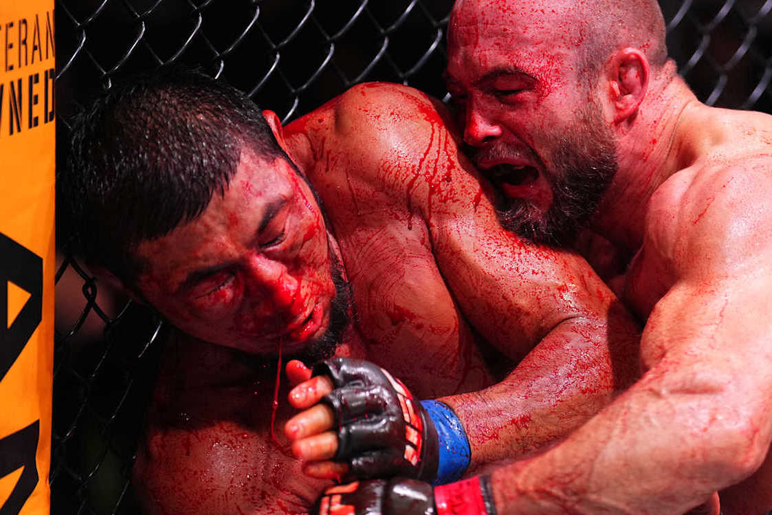 ABU DHABI, UNITED ARAB EMIRATES - OCTOBER 26: (R-L) Mateusz Rebecki of Poland punches Myktybek Orolbai of Kyrgyzstan in a 160-pound catchweight fight during the UFC 308 event at Etihad Arena on October 26, 2024 in Abu Dhabi, United Arab Emirates. (Photo by Chris Unger/Zuffa LLC)