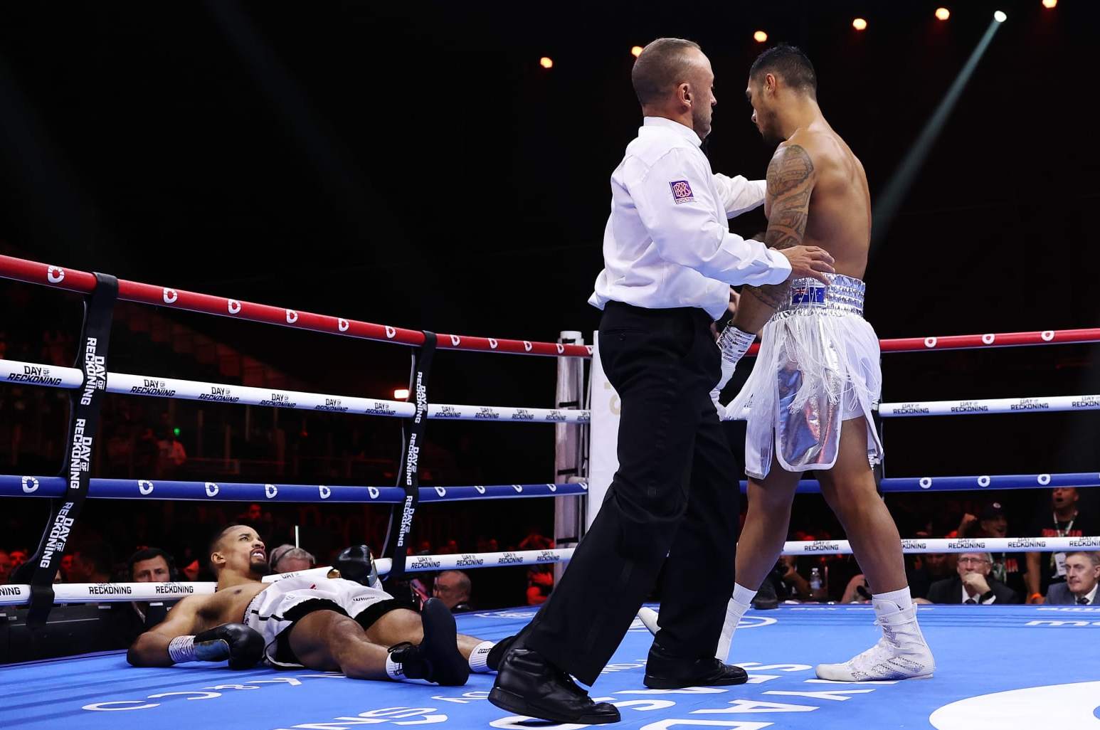 RIYADH, SAUDI ARABIA - DECEMBER 23: Ellis Zoro is knocked down by Jai Opetaia during the Cruiserweight fight between Jai Opetaia and Ellis Zoro during the Day of Reckoning: Fight Night at Kingdom Arena on December 23, 2023 in Riyadh, Saudi Arabia. (Photo by Richard Pelham/Getty Images)