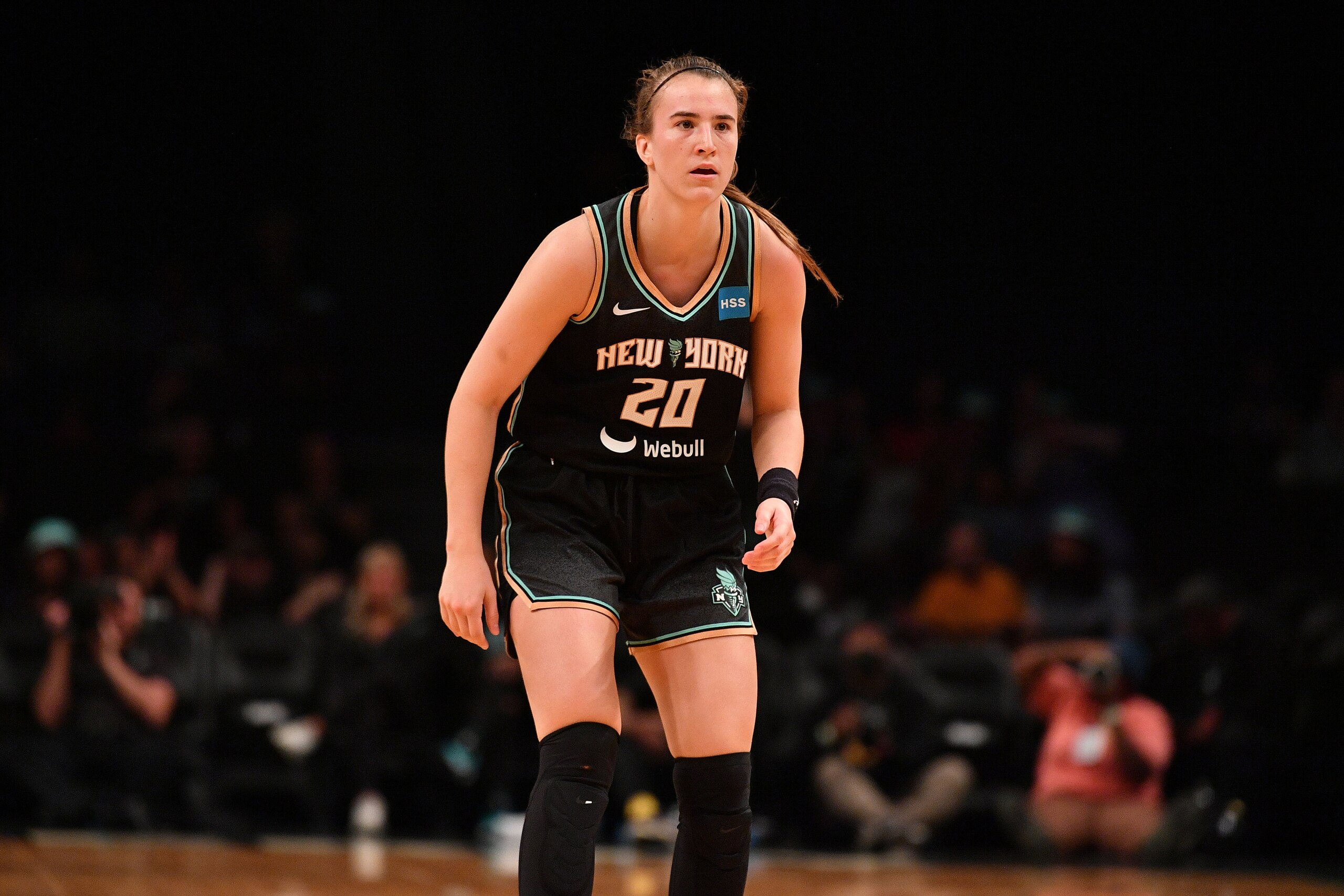 BROOKLYN, NY - JUNE 5: Sabrina Ionescu #20 of the New York Liberty looks on/ during the game against the Minnesota Lynx  on June 5, 2022 at the Barclays Center in Brooklyn, New York. NOTE TO USER: User expressly acknowledges and agrees that, by downloading and or using this photograph, user is consenting to the terms and conditions of the Getty Images License Agreement. Mandatory Copyright Notice: Copyright 2022 NBAE (Photo by Catalina Fragoso/NBAE via Getty Images)