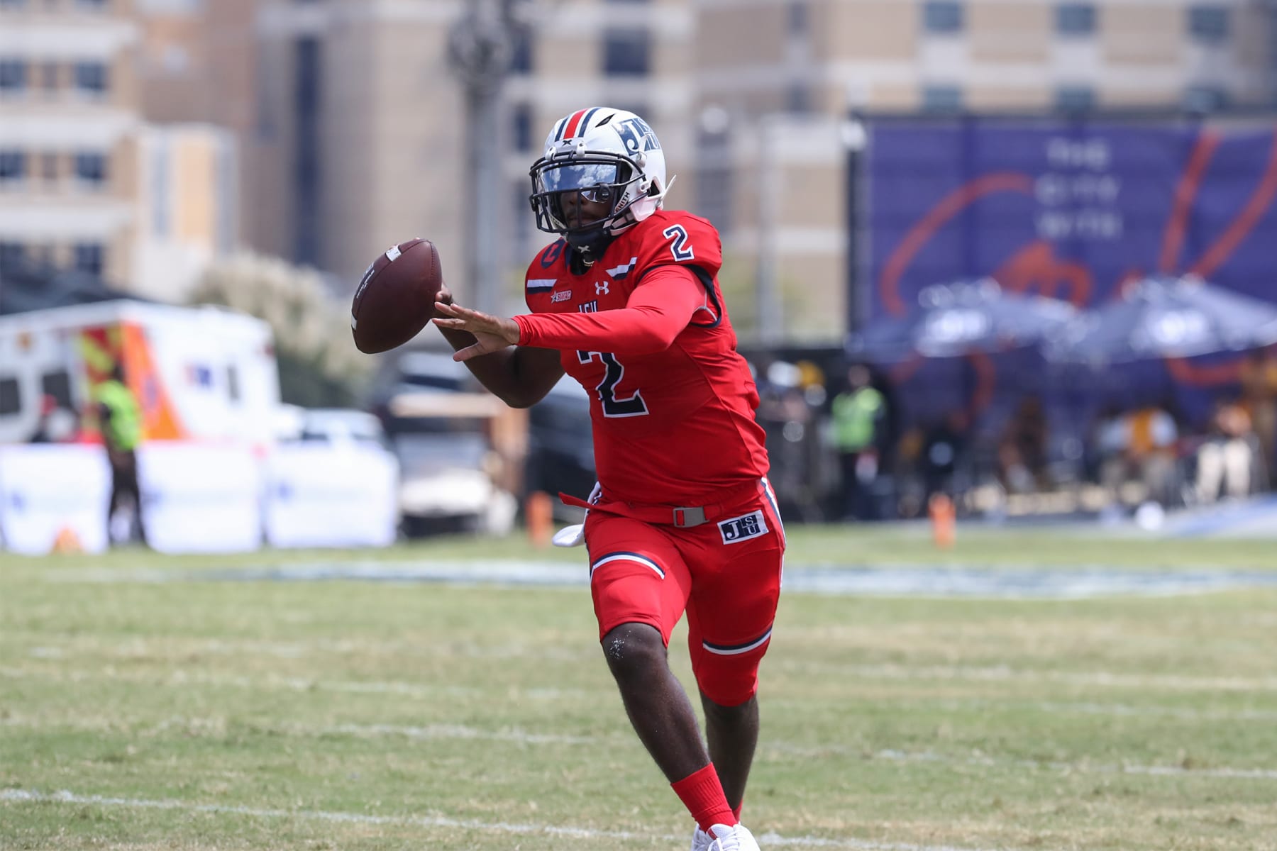 JACKSON, MISSISSIPPI SEPTEMBER 17: JSU quarterback Shedeur Sanders looks to pass during the downfield during their game against Grambling State. JSU won 66-24 in their home opener. (Aron Smith/Jackson State via Getty Images)