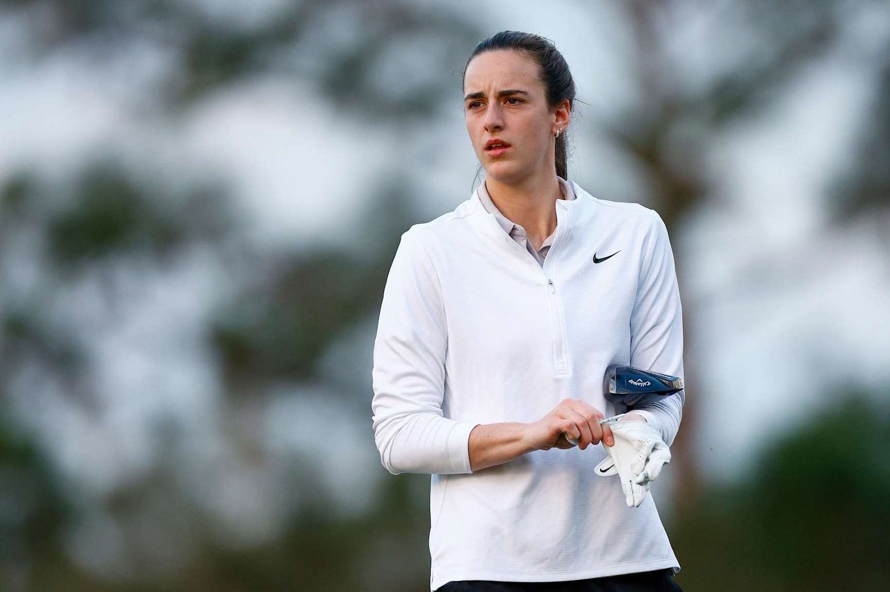 BELLEAIR, FLORIDA - NOVEMBER 13: Caitlin Clark, professional basketball player, prepares to play her shot from the second tee during a Pro-Am prior to The ANNIKA driven by Gainbridge at Pelican 2024 at Pelican Golf Club on November 13, 2024 in Belleair, Florida. (Photo by Douglas P. DeFelice/Getty Images)
