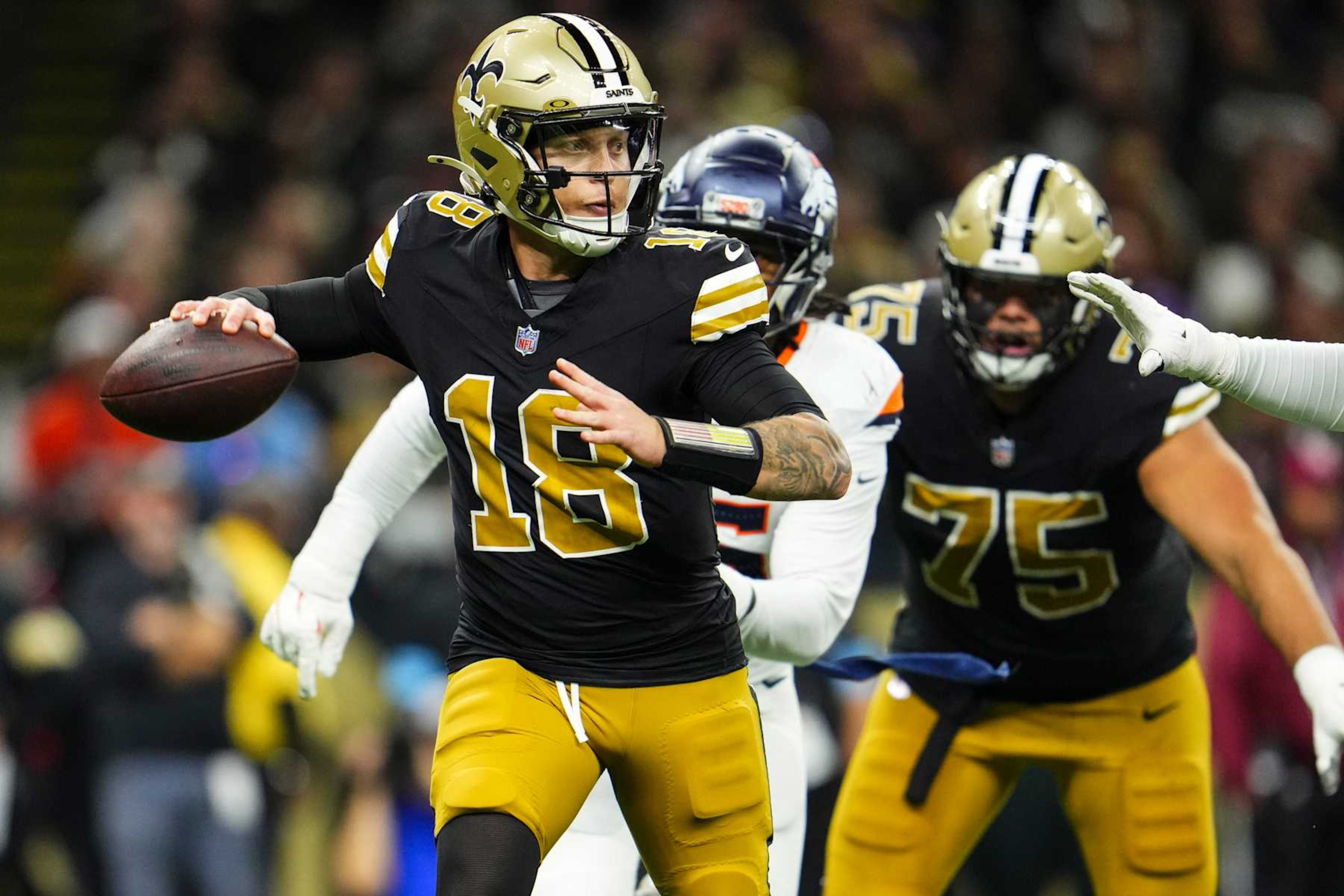 NEW ORLEANS, LA - OCTOBER 17: Spencer Rattler #18 of the New Orleans Saints throws the ball during an NFL football game against the Denver Broncos at Caesars Superdome on October 17, 2024 in New Orleans, Louisiana. (Photo by Cooper Neill/Getty Images) NEW ORLEANS, LA - OCTOBER 17: Spencer Rattler #18 of the New Orleans Saints throws the ball during an NFL football game against the Denver Broncos at Caesars Superdome on October 17, 2024 in New Orleans, Louisiana. (Photo by Cooper Neill/Getty Images)