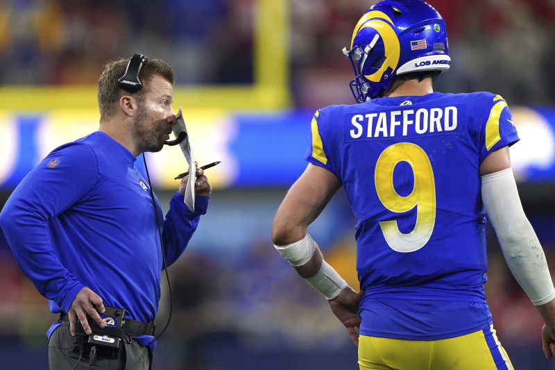 Los Angeles Rams head coach Sean McVay talks with quarterback Matthew Stafford (9) against the San Francisco 49ers during the NFL NFC Championship game, Sunday, Jan. 30, 2022 in Inglewood, Calif. The Rams defeated the 49ers 20-17. (AP Photo/Doug Benc)