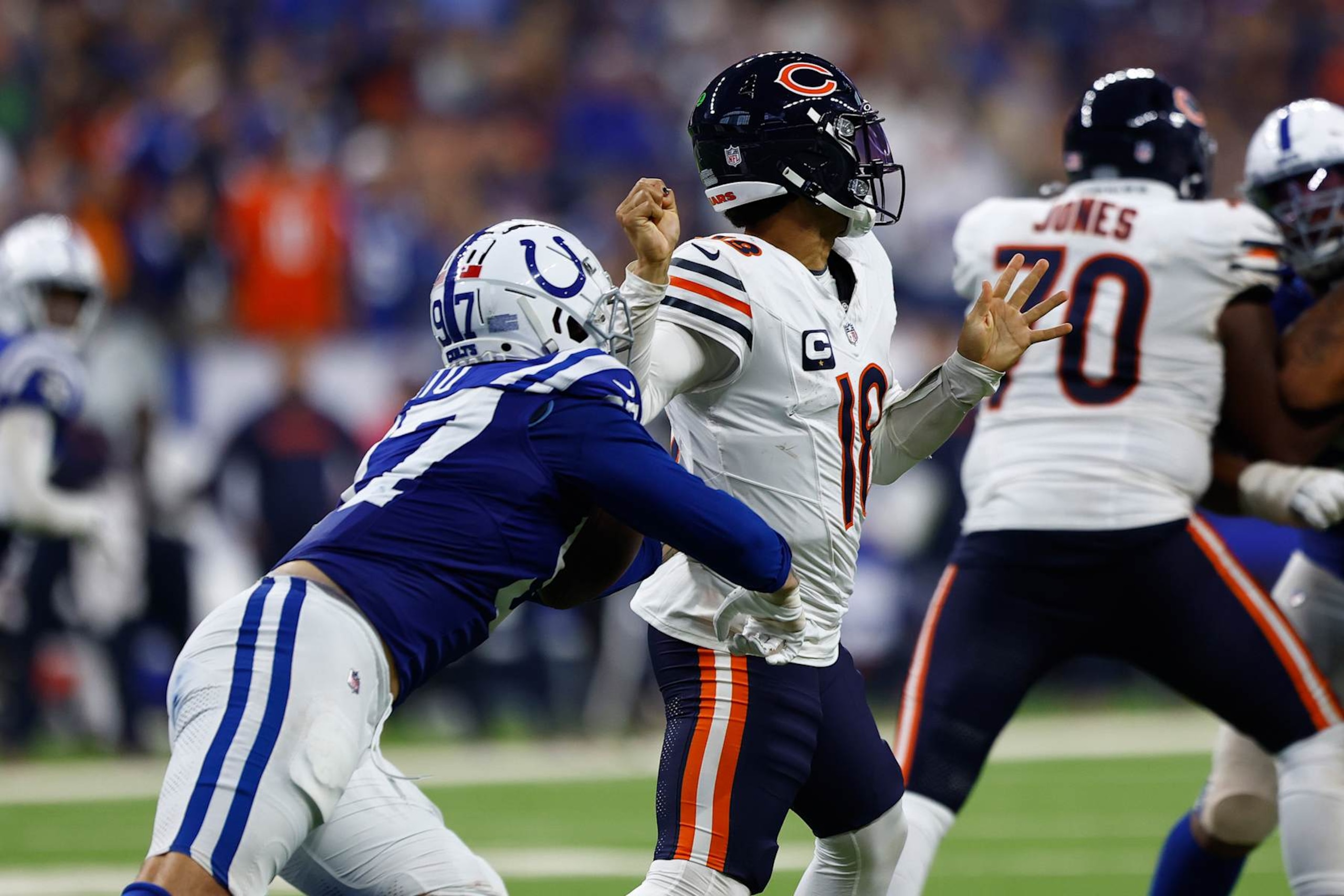 Indianapolis Colts defensive end Laiatu Latu with the strip-sack on Chicago Bears quarterback Caleb Williams. Indianapolis Colts defensive end Laiatu Latu with the strip-sack on Chicago Bears quarterback Caleb Williams.