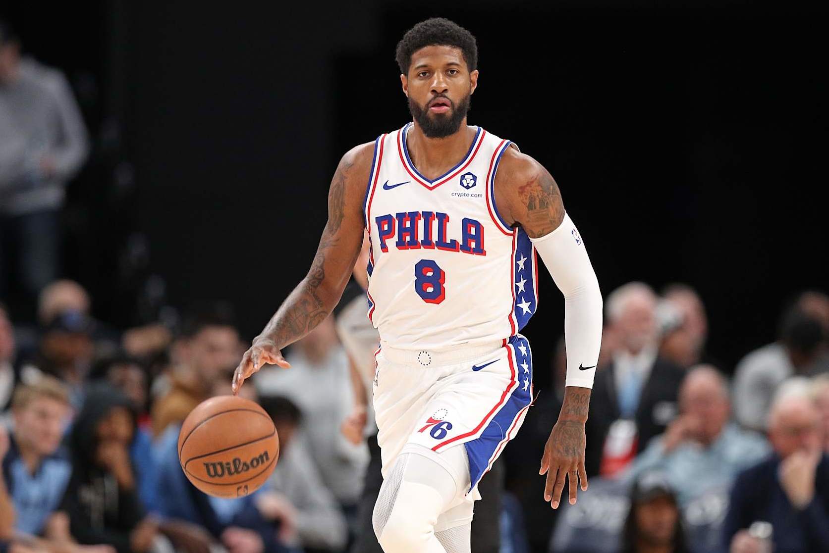 MEMPHIS, TENNESSEE - NOVEMBER 20: Paul George #8 of the Philadelphia 76ers brings the ball up court during the game against the Memphis Grizzlies at FedExForum on November 20, 2024 in Memphis, Tennessee. NOTE TO USER: User expressly acknowledges and agrees that, by downloading and or using this photograph, User is consenting to the terms and conditions of the Getty Images License Agreement. (Photo by Justin Ford/Getty Images)