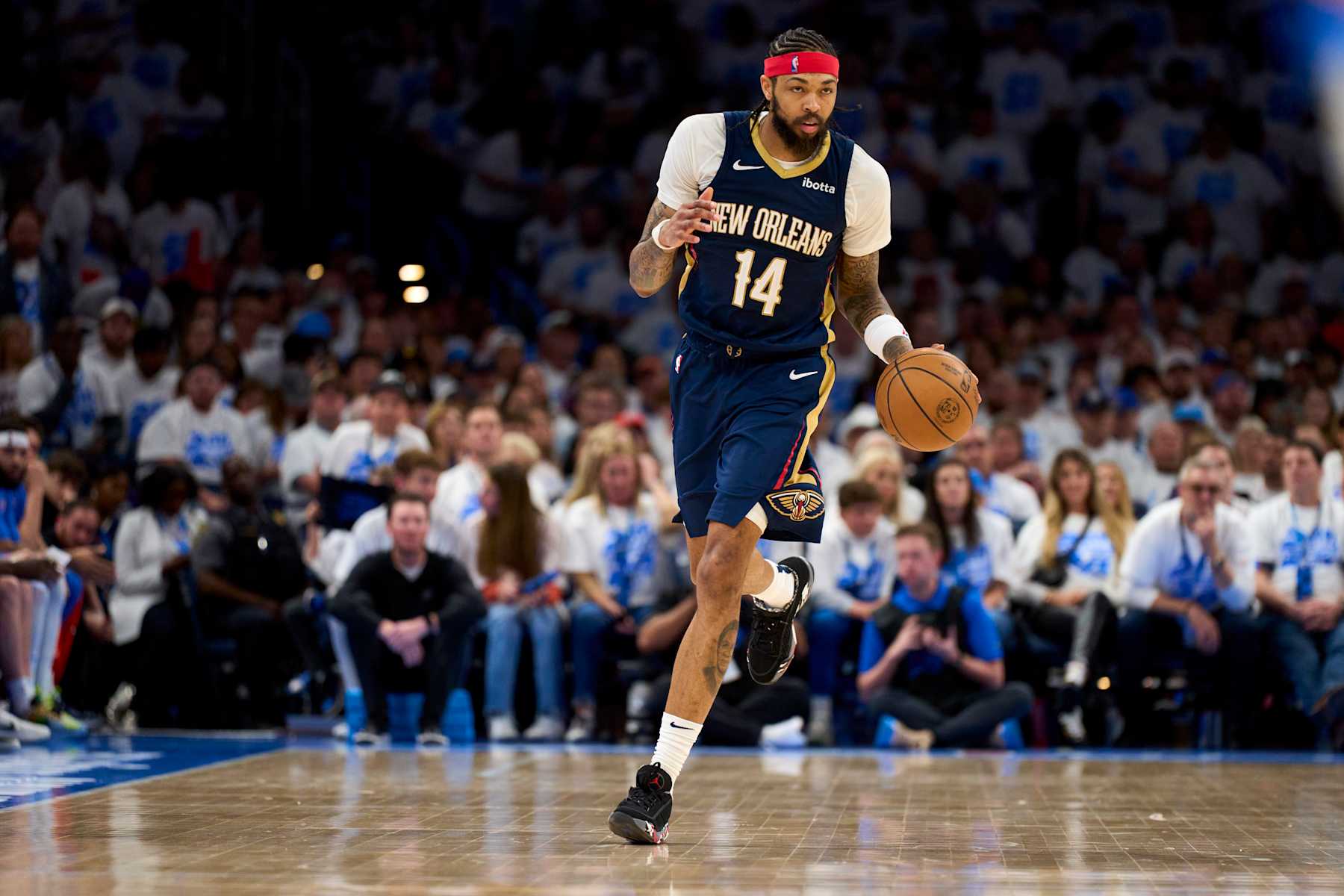 OKLAHOMA CITY, OKLAHOMA - APRIL 21: Brandon Ingram #14 of the New Orleans Pelicans brings the ball up court against the Oklahoma City Thunder in game one of the Western Conference First Round Playoffs at the Paycom Center on April 21, 2024 in Oklahoma City, Oklahoma. NOTE TO USER: User expressly acknowledges and agrees that, by downloading and or using this photograph, User is consenting to the terms and conditions of the Getty Images License Agreement.  (Photo by Cooper Neill/Getty Images)