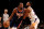NEW YORK, NEW YORK - NOVEMBER 27:  Kevin Durant #7 of the Brooklyn Nets heads for the net as Mikal Bridges #25 of the Phoenix Suns defends at Barclays Center on November 27, 2021 in New York City. The Phoenix Suns defeated the Brooklyn Nets 113-107. NOTE TO USER: User expressly acknowledges and agrees that, by downloading and or using this photograph, User is consenting to the terms and conditions of the Getty Images License Agreement. (Photo by Elsa/Getty Images)