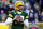 GREEN BAY, WISCONSIN - NOVEMBER 28: Aaron Rodgers #12 of the Green Bay Packers looks to throw the ball during the first quarter against the Los Angeles Rams at Lambeau Field on November 28, 2021 in Green Bay, Wisconsin. (Photo by Stacy Revere/Getty Images)