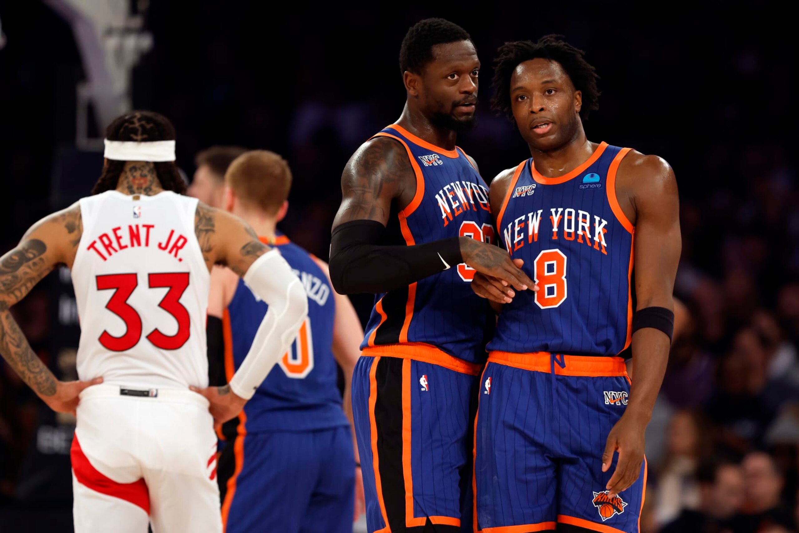 NEW YORK, NEW YORK - JANUARY 20: OG Anunoby #8 talks with Julius Randle #30 of the New York Knicks during the second half against the Toronto Raptors at Madison Square Garden on January 20, 2024 in New York City. The Knicks won 126-120. NOTE TO USER: User expressly acknowledges and agrees that, by downloading and/or using this Photograph, user is consenting to the terms and conditions of the Getty Images License Agreement. (Photo by Sarah Stier/Getty Images)