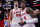 HOUSTON, TEXAS - NOVEMBER 10: Alperen Sengun #28 of the Houston Rockets hugs Jalen Green #4 after defeating the New Orleans Pelicans 104-101 at Toyota Center on November 10, 2023 in Houston, Texas. NOTE TO USER: User expressly acknowledges and agrees that, by downloading and or using this photograph, User is consenting to the terms and conditions of the Getty Images License Agreement.  (Photo by Carmen Mandato/Getty Images)