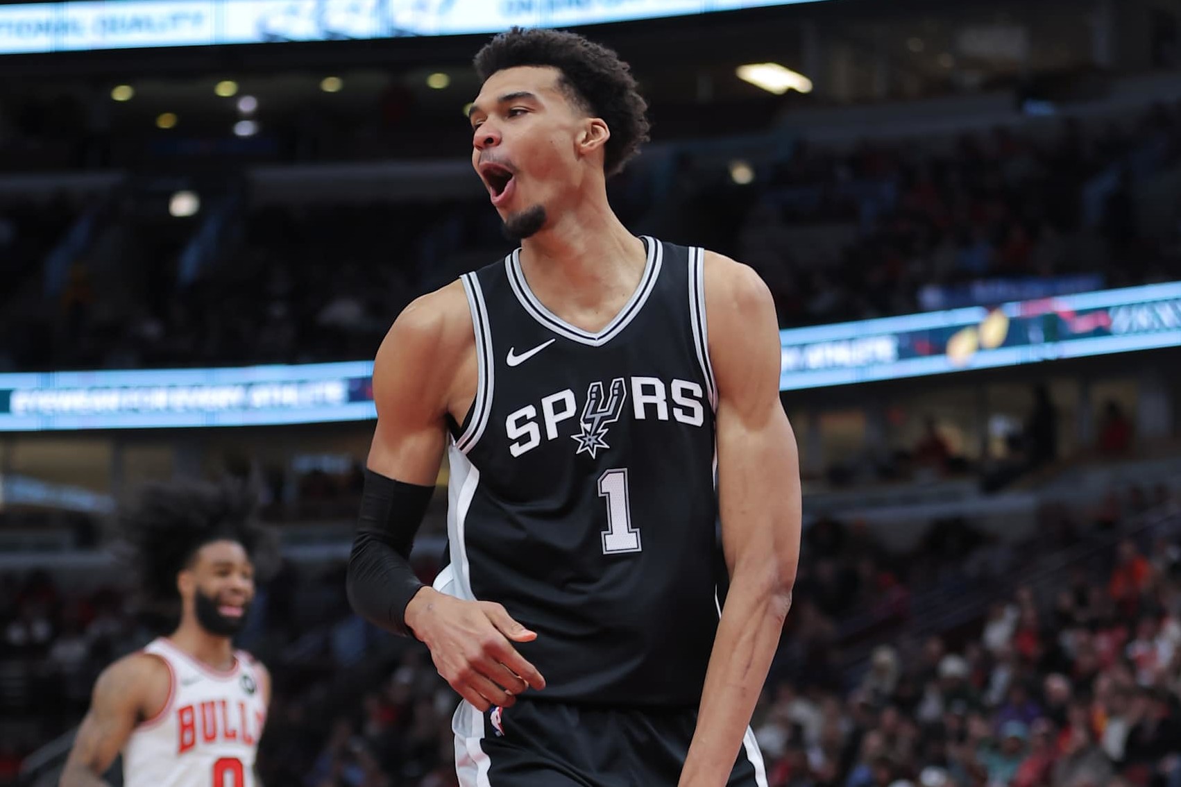 CHICAGO, IL - JANUARY 06: Victor Wembanyama #1 of the San Antonio Spurs reacts after a slam dunk during the first half against the Chicago Bulls on January 6, 2025 at the United Center in Chicago, Illinois. (Photo by Melissa Tamez/Icon Sportswire via Getty Images)