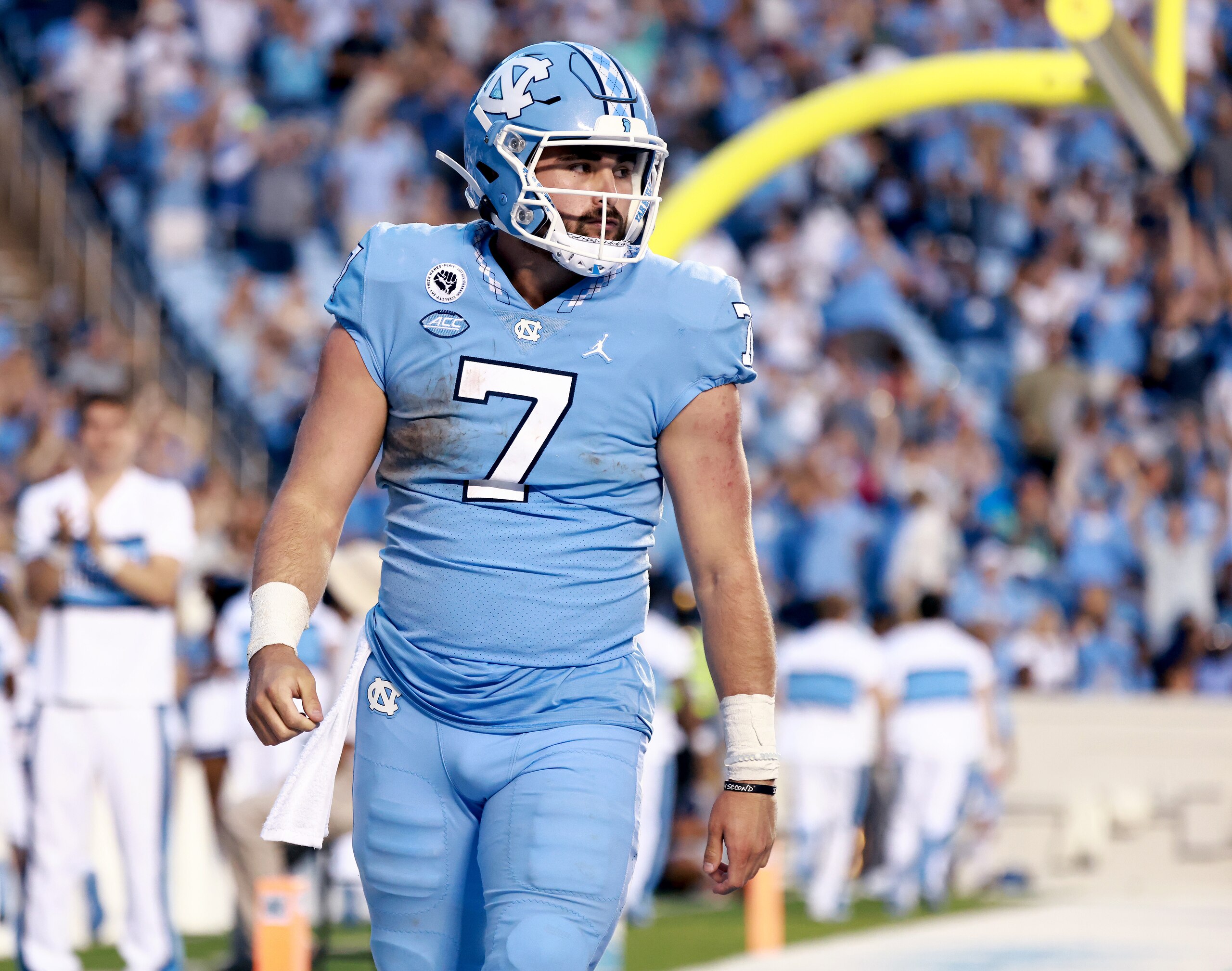 CHAPEL HILL, NORTH CAROLINA - OCTOBER 16: Sam Howell #7 of the North Carolina Tar Heels stares down the Miami Hurricanes defense after scoring a touchdown during their game at Kenan Memorial Stadium on October 16, 2021 in Chapel Hill, North Carolina. North Carolina won 45-42. (Photo by Grant Halverson/Getty Images)