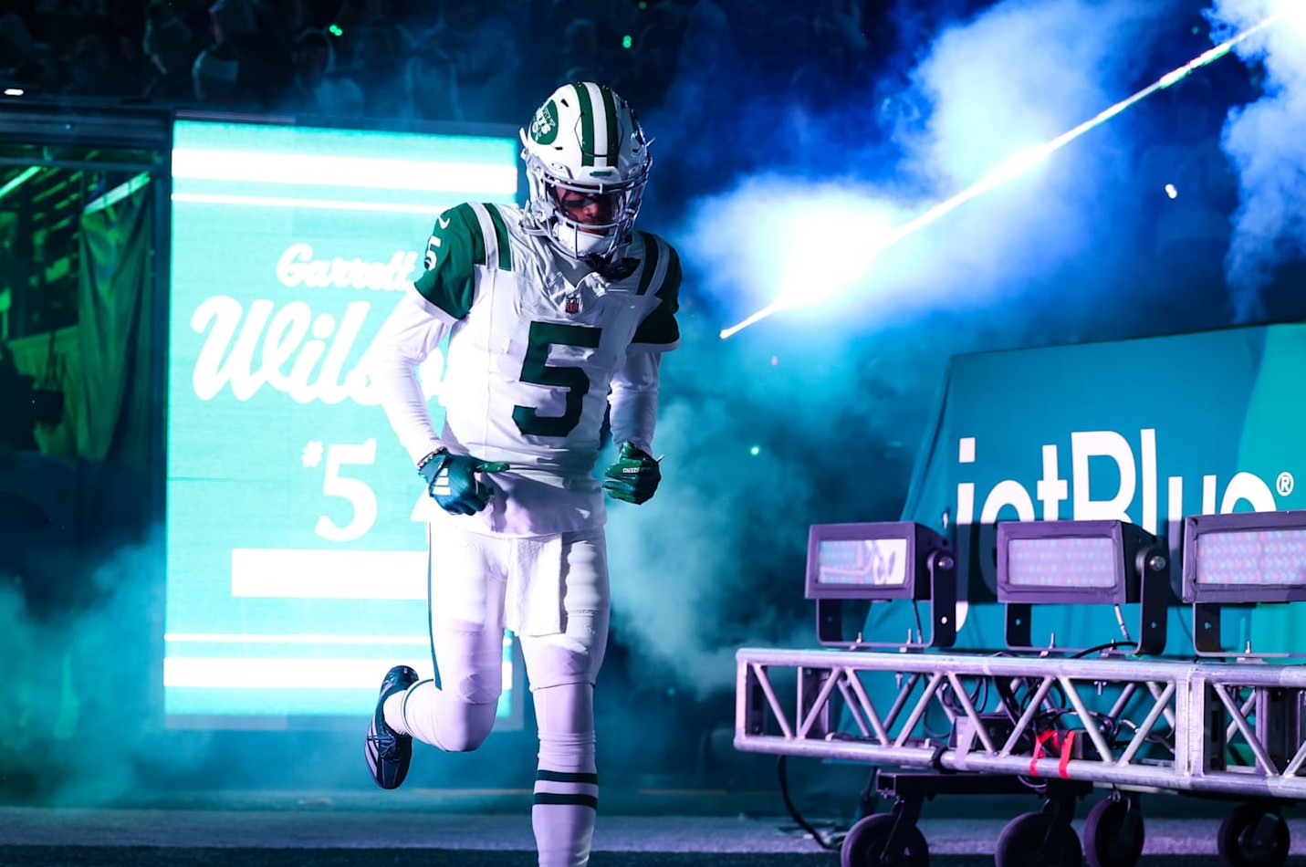 EAST RUTHERFORD, NJ - OCTOBER 14: Garrett Wilson #5 of the New York Jets runs out of the tunnel prior to an NFL football game against the Buffalo Bills at MetLife Stadium on October 14, 2024 in East Rutherford, NJ. (Photo by Perry Knotts/Getty Images)