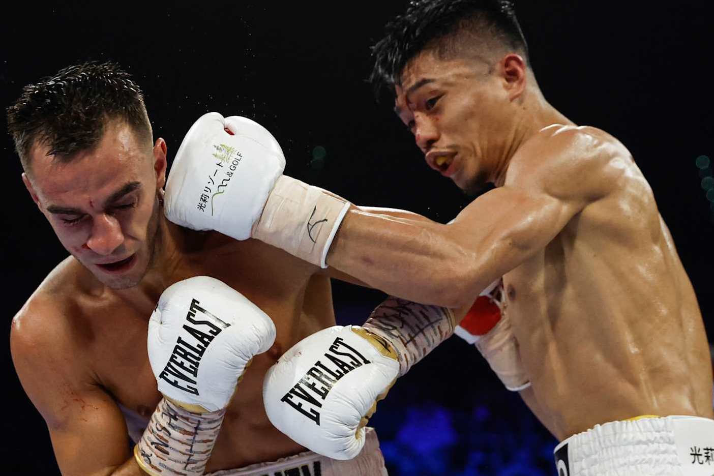 LAS VEGAS, NEVADA - MAY 20: Andrew Moloney of Australia is punched by Junto Nakatani of Japan during their junior bantamweight bout at MGM Grand Garden Arena on May 20, 2023 in Las Vegas, Nevada. (Photo by Sarah Stier/Getty Images)