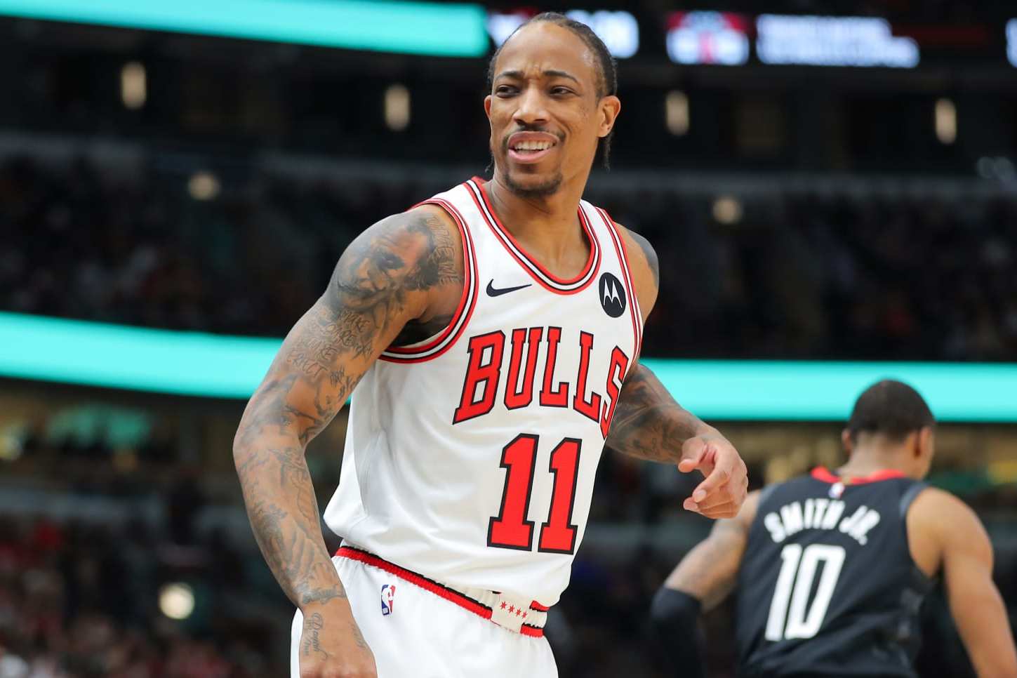 CHICAGO, IL - JANUARY 10: DeMar DeRozan #11 of the Chicago Bulls reacts after a 3-point basket during the first half against the Houston Rockets at the United Center on January 10, 2024 in Chicago, Illinois. (Photo by Melissa Tamez/Icon Sportswire via Getty Images)