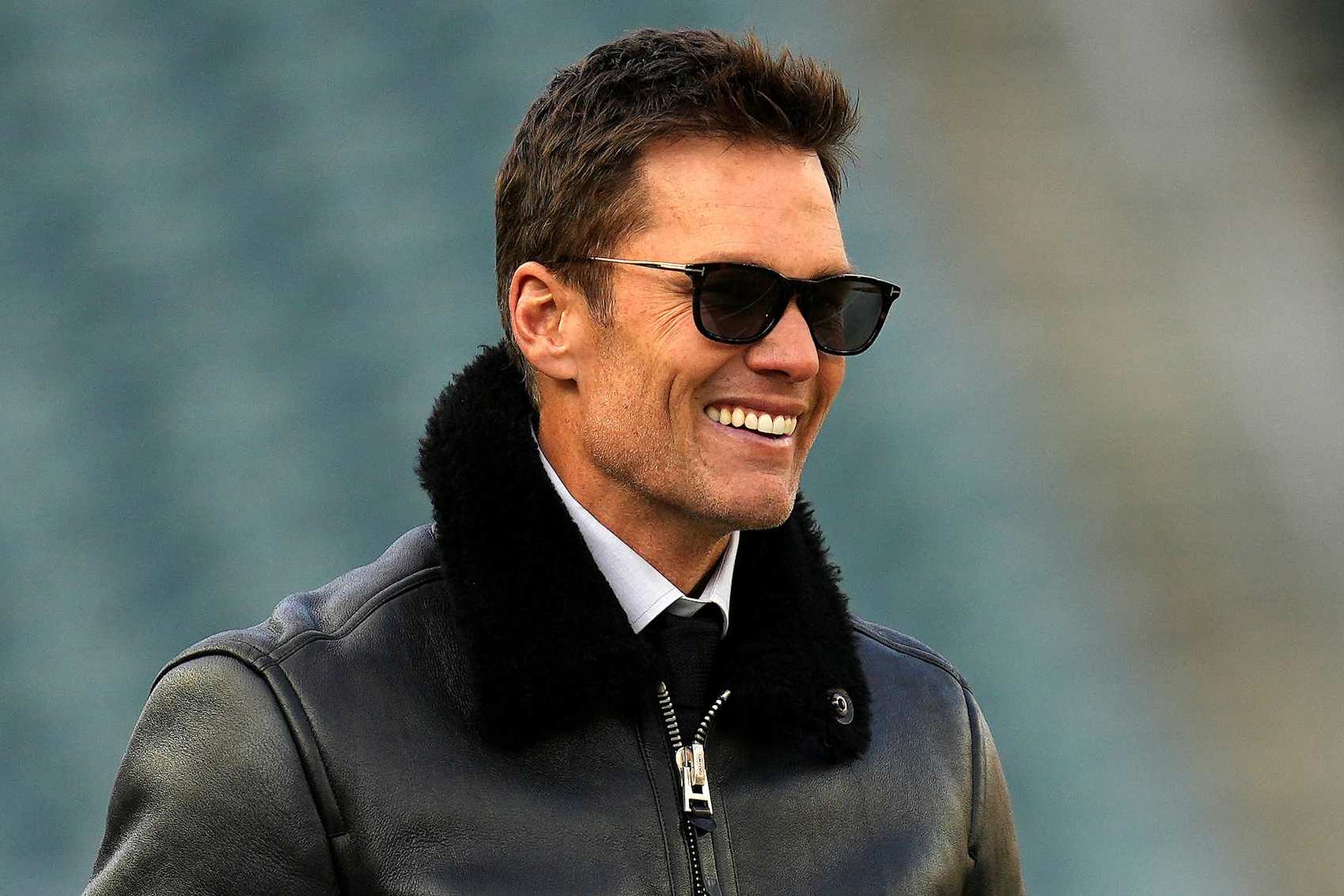 PHILADELPHIA, PENNSYLVANIA - JANUARY 12: Former NFL Player Tom Brady looks on prior to the NFC Wild Card Playoff between the Green Bay Packers and the Philadelphia Eagles at Lincoln Financial Field on January 12, 2025 in Philadelphia, Pennsylvania.  (Photo by Mitchell Leff/Getty Images)