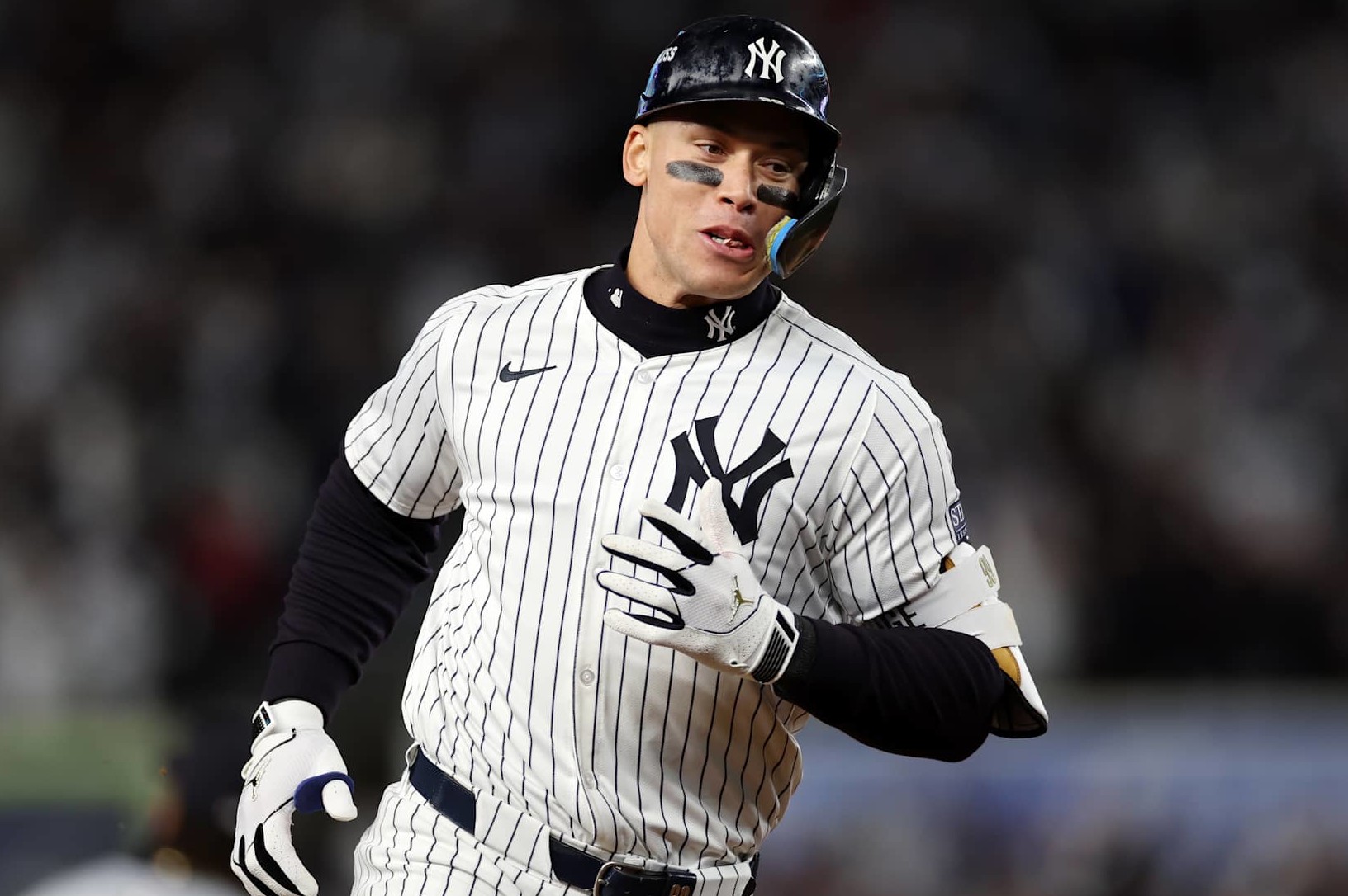 NEW YORK, NEW YORK - OCTOBER 15: Aaron Judge #99 of the New York Yankees rounds the bases after hitting a two-run home run in the seventh inning against the Cleveland Guardians during Game Two of the American League Championship Series at Yankee Stadium on October 15, 2024 in New York City. (Photo by Sarah Stier/Getty Images)