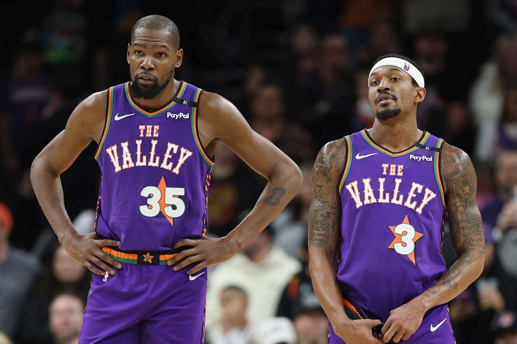 PHOENIX, ARIZONA - JANUARY 12: Kevin Durant #35 and Bradley Beal #3 of the Phoenix Suns during the second half of the NBA game at Footprint Center on January 12, 2025 in Phoenix, Arizona. The Suns defeated the Hornets 120-113. NOTE TO USER: User expressly acknowledges and agrees that, by downloading and or using this photograph, User is consenting to the terms and conditions of the Getty Images License Agreement. (Photo by Christian Petersen/Getty Images)