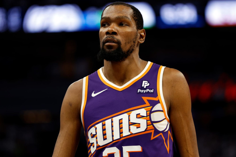 MINNEAPOLIS, MINNESOTA - APRIL 23: Kevin Durant #35 of the Phoenix Suns looks on against the Minnesota Timberwolves in the fourth quarter of game two of the Western Conference First Round Playoffs at Target Center on April 23, 2024 in Minneapolis, Minnesota. The Timberwolves defeated the Sun 105-93. NOTE TO USER: User expressly acknowledges and agrees that, by downloading and or using this photograph, User is consenting to the terms and conditions of the Getty Images License Agreement. (Photo by David Berding/Getty Images)