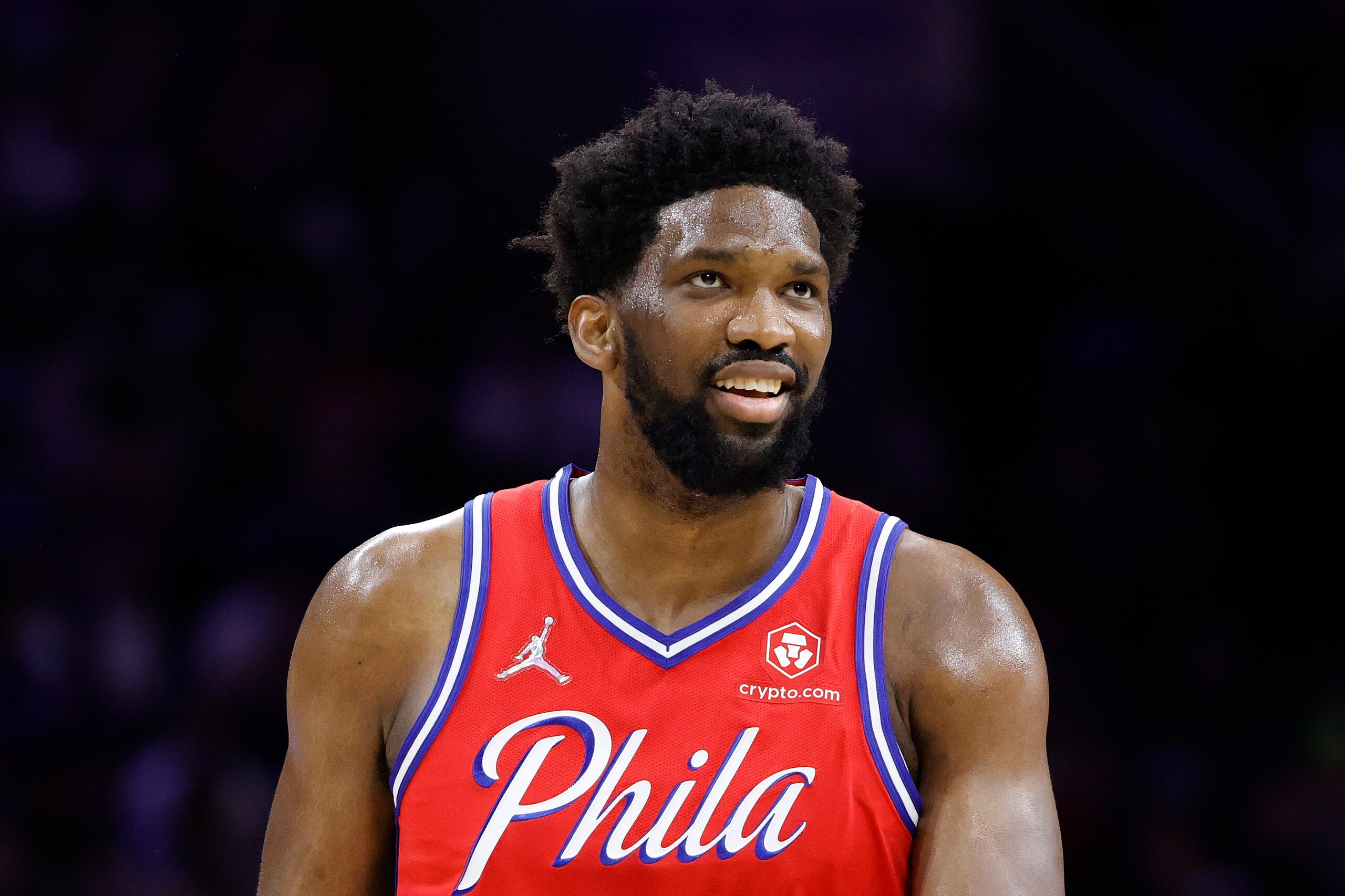 PHILADELPHIA, PENNSYLVANIA - APRIL 18: Joel Embiid #21 of the Philadelphia 76ers looks on during the fourth quarter against the Toronto Raptors during Game Two of the Eastern Conference First Round at Wells Fargo Center on April 18, 2022 in Philadelphia, Pennsylvania. NOTE TO USER: User expressly acknowledges and agrees that, by downloading and or using this photograph, User is consenting to the terms and conditions of the Getty Images License Agreement. (Photo by Tim Nwachukwu/Getty Images)