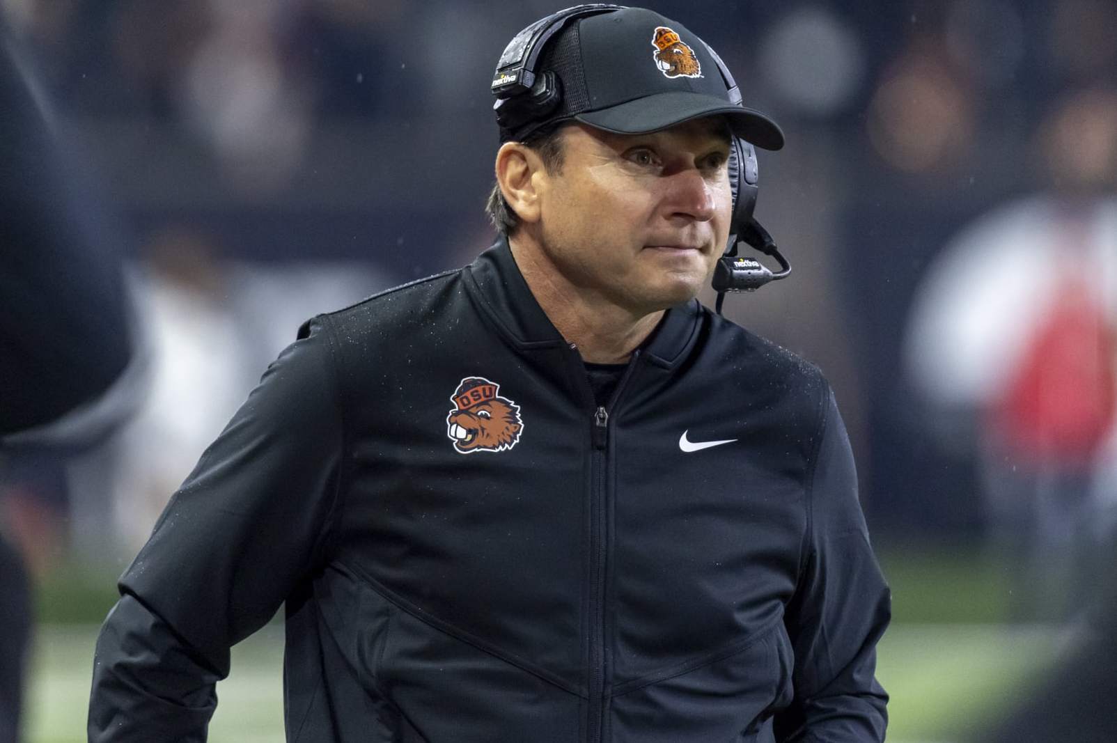 CORVALLIS, OREGON - OCTOBER 14: Head coach Jonathan Smith of the Oregon State Beavers walks on the field against the UCLA Bruins during the first half at Reser Stadium on October 14, 2023 in Corvallis, Oregon. (Photo by Tom Hauck/Getty Images)