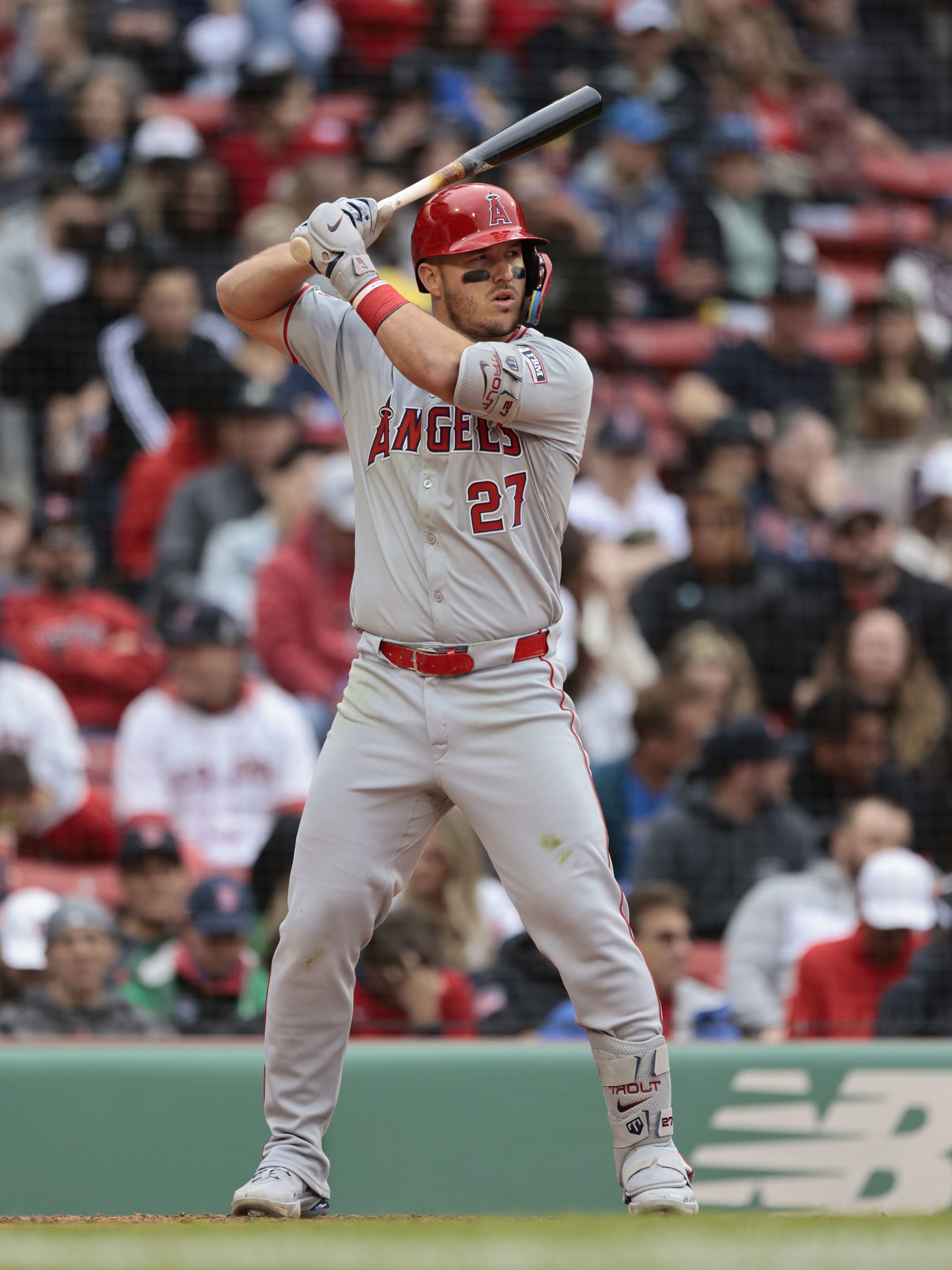 BOSTON, MASSACHUSETTS - APRIL 14: Mike Trout #27 of the Los Angeles Angels stands during an at bat in the game against the Boston Red Sox at Fenway Park on April 14, 2024 in Boston, Massachusetts. The Red Sox defeated the Angels 5-4. (Photo by Christopher Pasatieri/Getty Images)