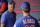 New York Mets hitting coach Eric Chavez, left, talks with Pete Alonso, right, in the dugout before a spring training baseball game against the Houston Astros, Monday, April 4, 2022, in West Palm Beach, Fla. (AP Photo/Sue Ogrocki)