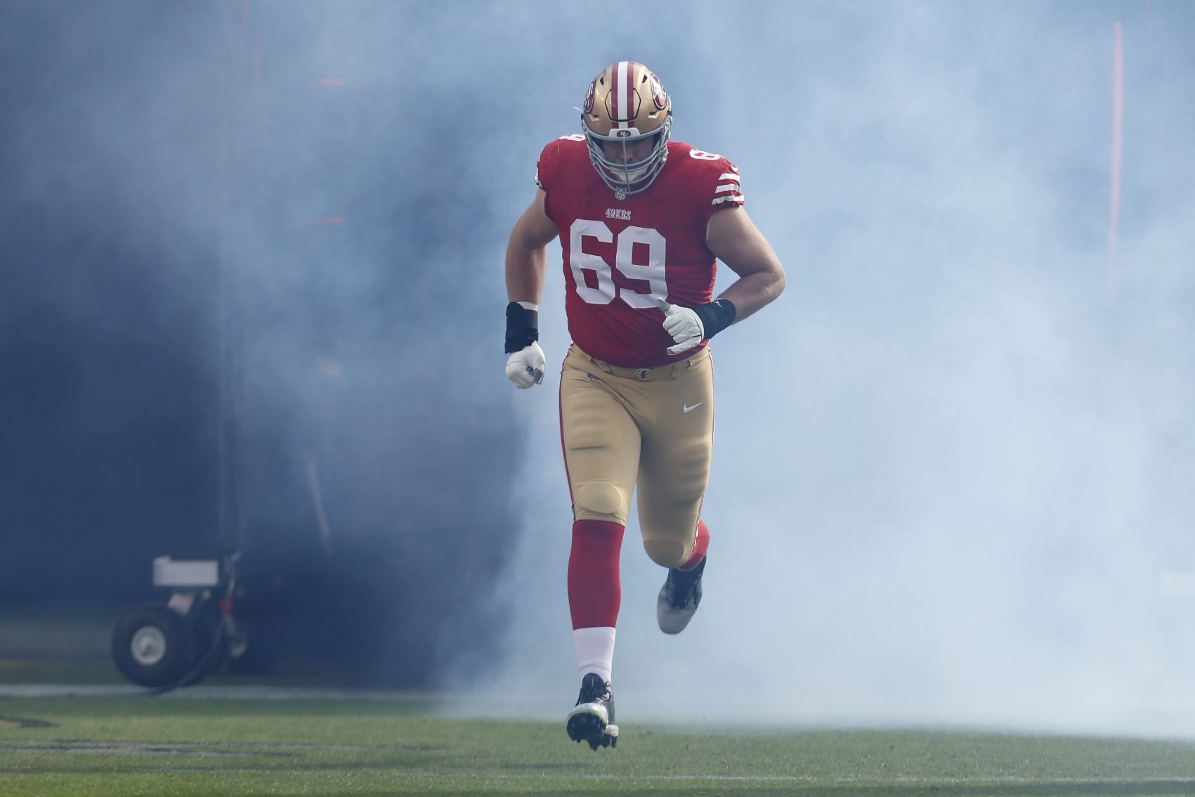 San Francisco 49ers offensive tackle Mike McGlinchey (69) is introduced before an NFL football game against the Miami Dolphins in Santa Clara, Calif., Sunday, Dec. 4, 2022. (AP Photo/Jed Jacobsohn) San Francisco 49ers offensive tackle Mike McGlinchey (69) is introduced before an NFL football game against the Miami Dolphins in Santa Clara, Calif., Sunday, Dec. 4, 2022. (AP Photo/Jed Jacobsohn)