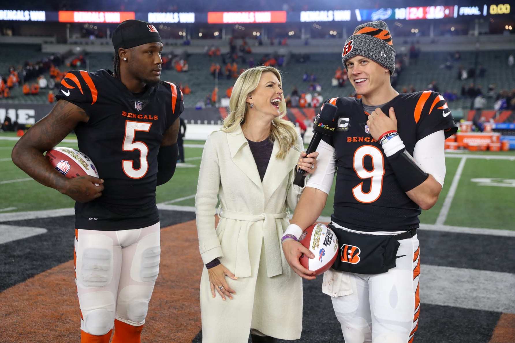 CINCINNATI, OH - NOVEMBER 05: Cincinnati Bengals wide receiver Tee Higgins (5) and quarterback Joe Burrow (9) talk with NBC sideline reporter Melissa Stark after the game against the Buffalo Bills and the Cincinnati Bengals on November 5, 2023, at Paycor Stadium in Cincinnati, OH. (Photo by Ian Johnson/Icon Sportswire via Getty Images)
