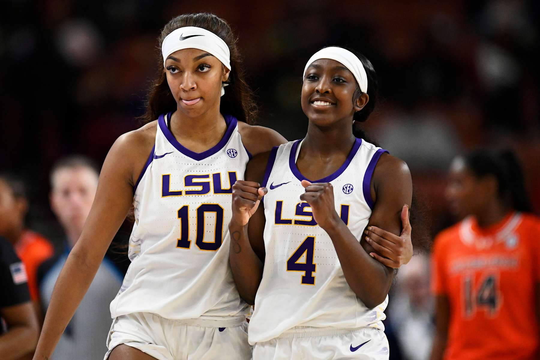 GREENVILLE, SOUTH CAROLINA - MARCH 08: Angel Reese #10 and Flau'jae Johnson #4 of the LSU Lady Tigers react against the Auburn Tigers in the third quarter during the quarterfinals of the SEC Women's Basketball Tournament at Bon Secours Wellness Arena on March 08, 2024 in Greenville, South Carolina. (Photo by Eakin Howard/Getty Images)