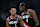 PORTLAND, OREGON - DECEMBER 01: Anfernee Simons #1 talks with Jerami Grant #9 of the Portland Trail Blazers during the first half against the Dallas Mavericks at Moda Center on December 01, 2024 in Portland, Oregon. NOTE TO USER: User expressly acknowledges and agrees that, by downloading and or using this photograph, User is consenting to the terms and conditions of the Getty Images License Agreement. (Photo by Soobum Im/Getty Images)