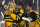 BOSTON, MASSACHUSETTS - JANUARY 02: Linus Ullmark #35 and Jake DeBrusk #74 of the Boston Bruins celebrate after the 2023 Discover NHL Winter Classic game between the Pittsburgh Penguins and the Boston Bruins at Fenway Park on January 02, 2023 in Boston, Massachusetts. The Bruins defeated the Penguins 2-1. (Photo by Joe Sargent/NHLI via Getty Images)