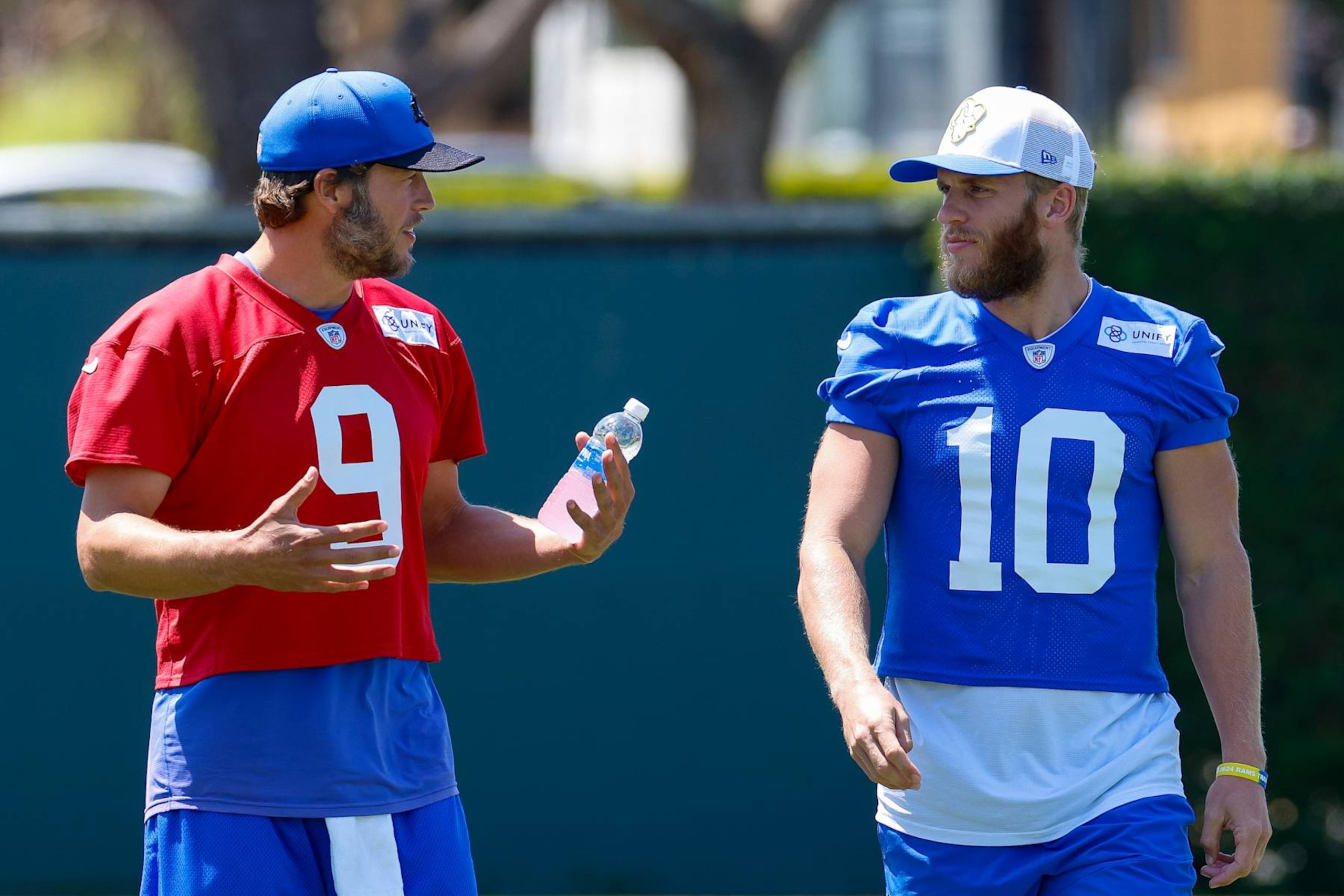 LOS ANGELES, CA - JULY 26: Los Angeles Rams quarterback Matthew Stafford (9) talks with wide receiver Cooper Kupp (10) during the team's training camp at Loyola Marymount University on July 26, 2024 in Los Angeles, CA. (Photo by Brandon Sloter/Icon Sportswire via Getty Images)