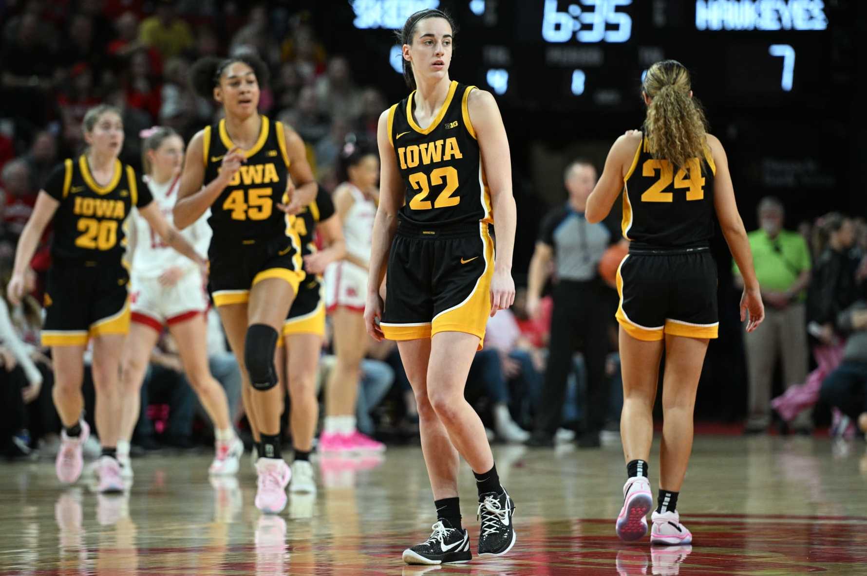 LINCOLN, NEBRASKA - FEBRUARY 11: Caitlin Clark #22 of the Iowa Hawkeyes looks to the sidelines during a break in the game against the Nebraska Cornhuskers in the first half at Pinnacle Bank Arena on February 11, 2024 in Lincoln, Nebraska. (Photo by Steven Branscombe/Getty Images)