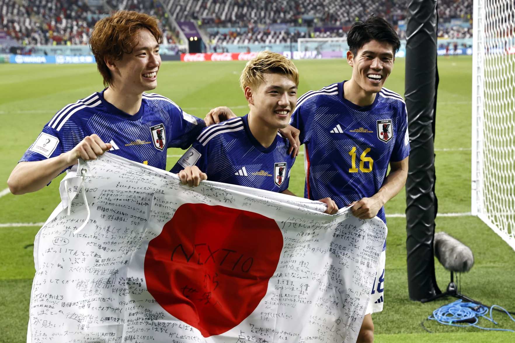 Japan sneak through to World Cup last 16 despite Poland defeat